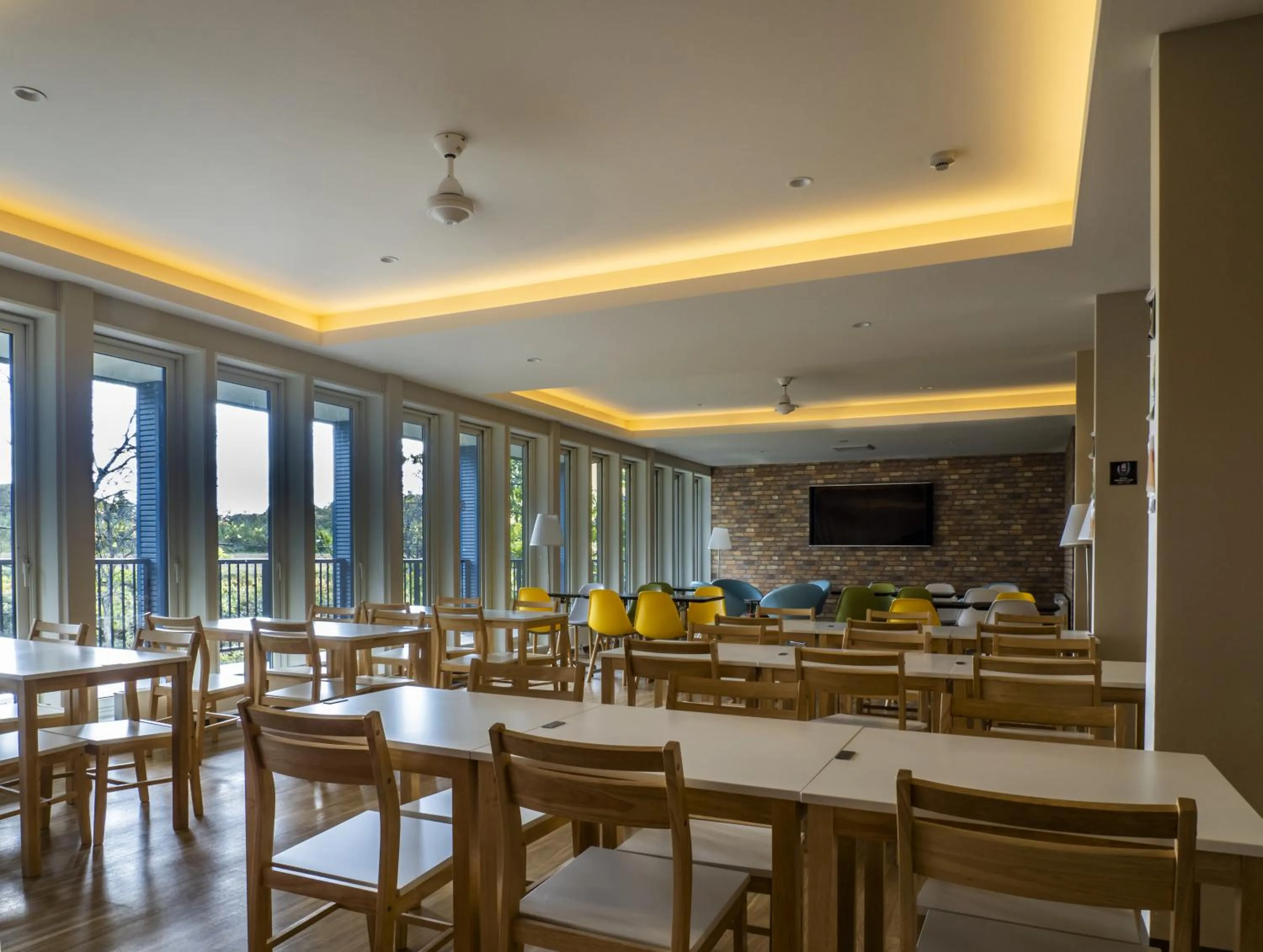 Communal lounge/ TV room in My Ecolodge