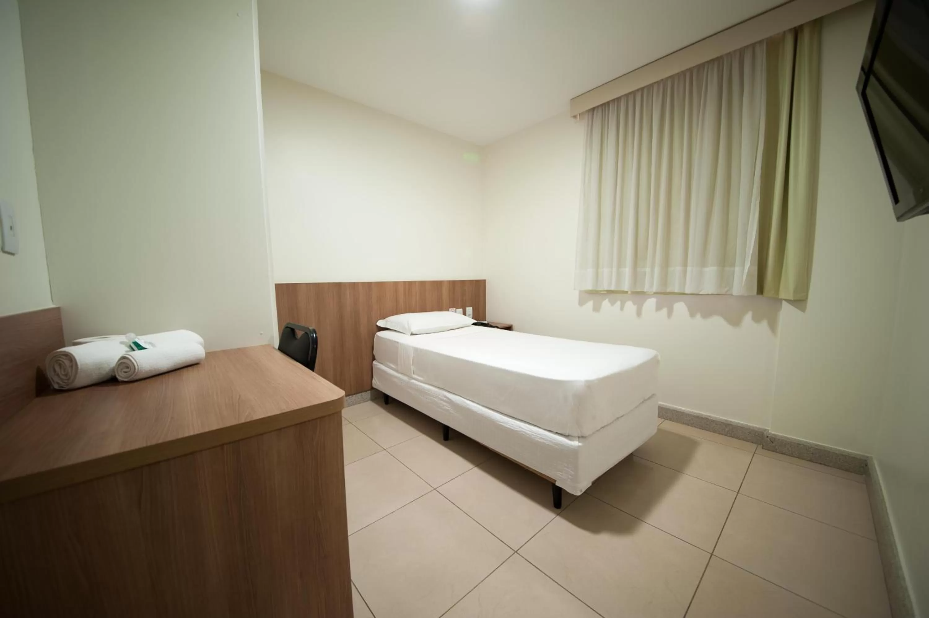 Photo of the whole room, Bed in Premium Executive Hotel Itabira