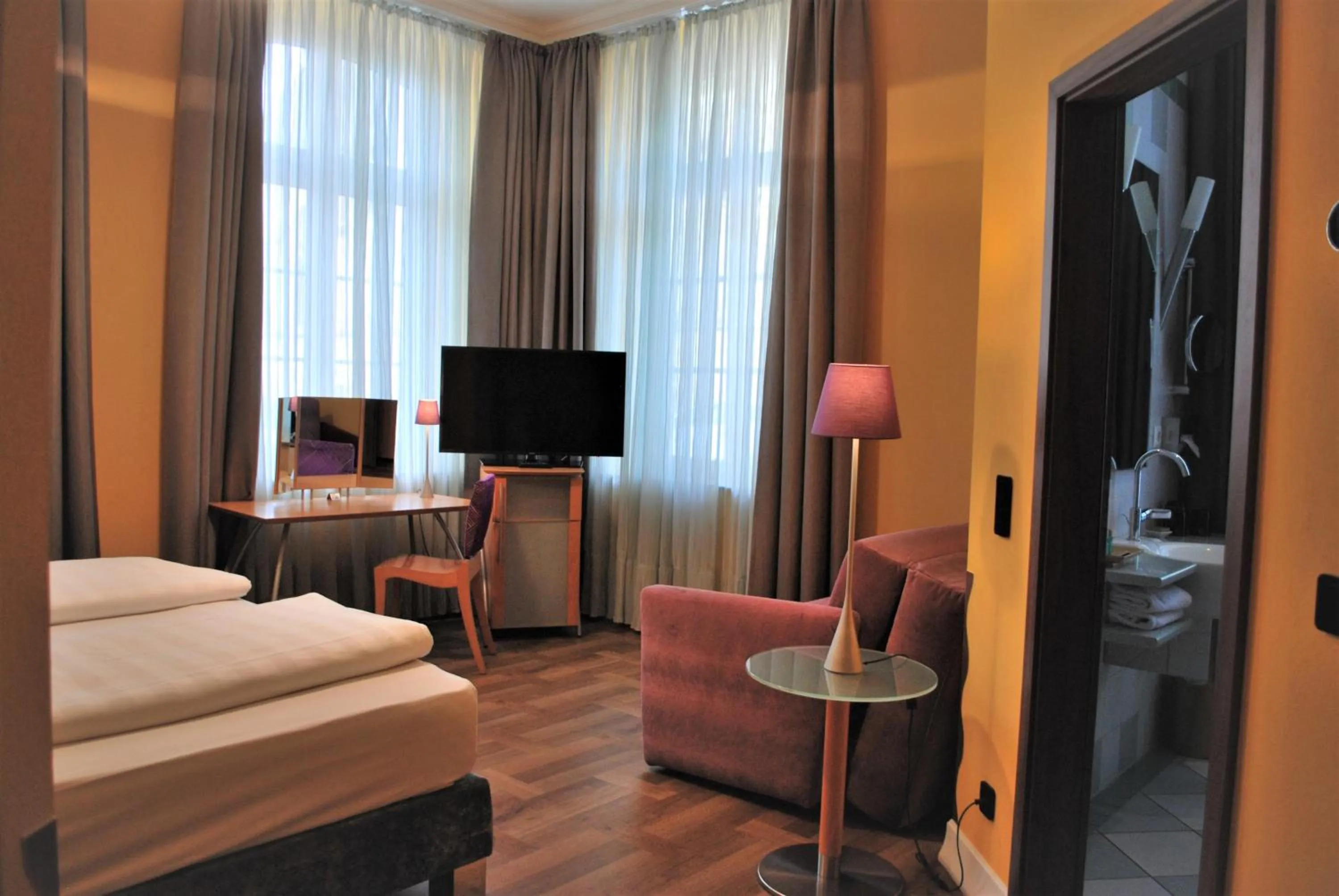 Bed in Classic Hotel Harmonie