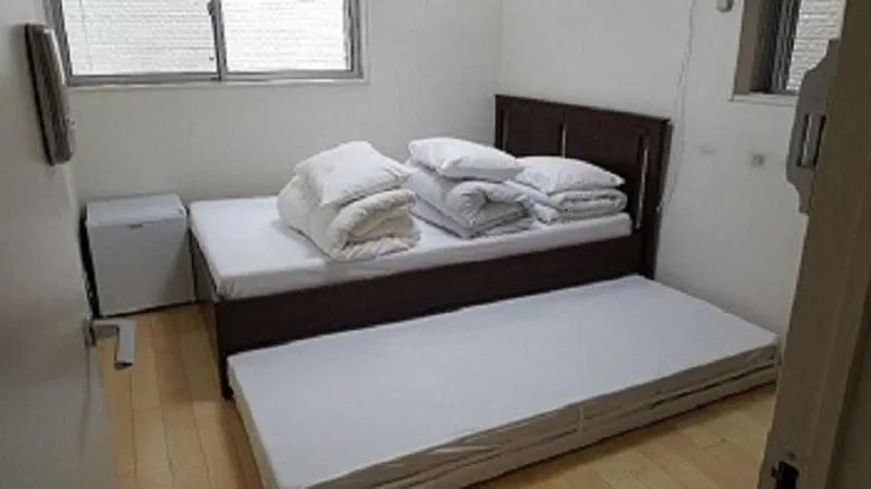 Bed in Sophiearth Apartment