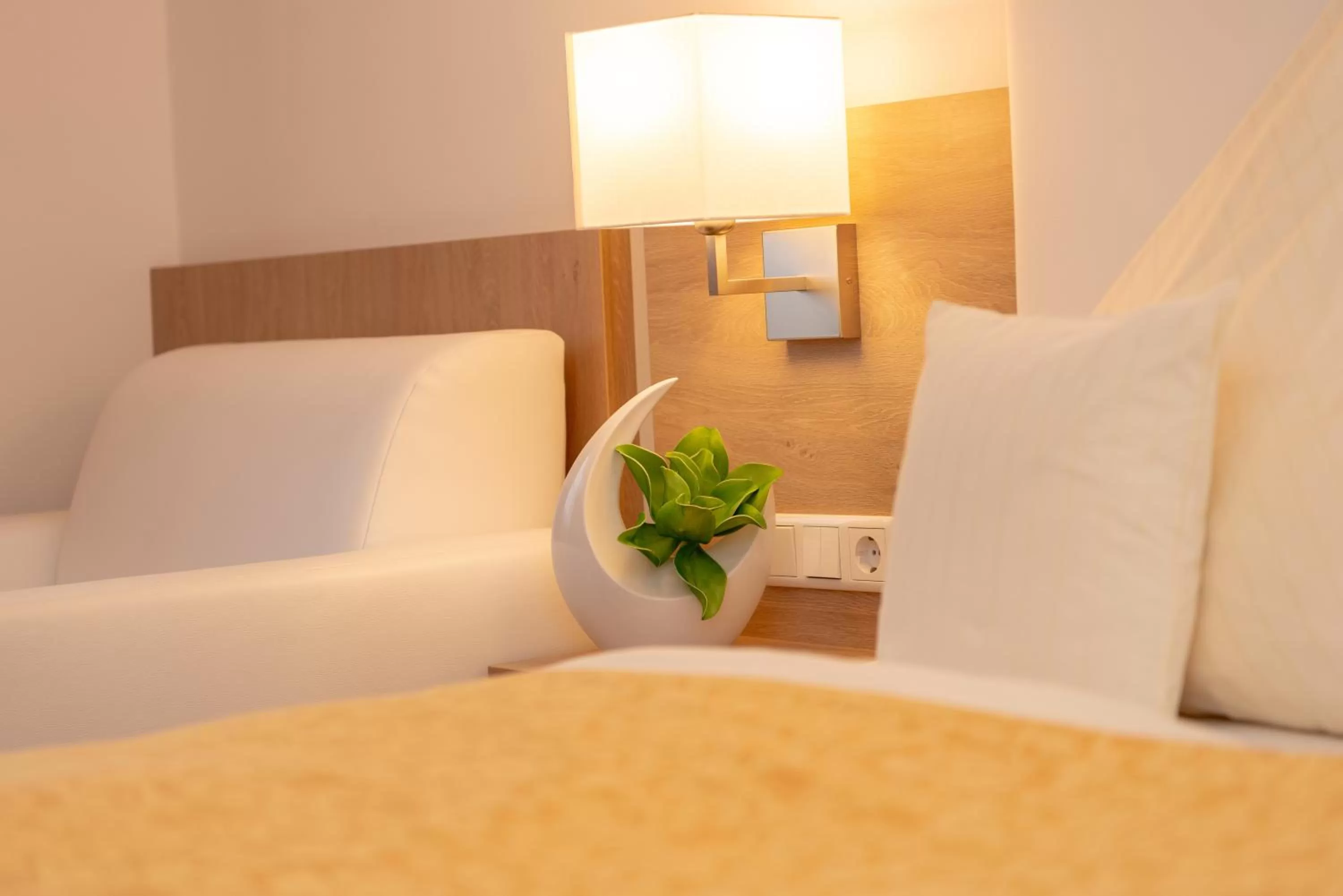 Decorative detail, Bed in Wander und Aktiv Hotel Rösslwirt