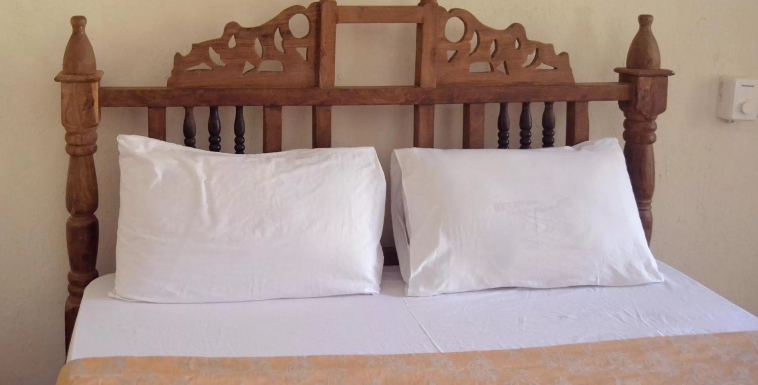Bed in Serene Beach Resort