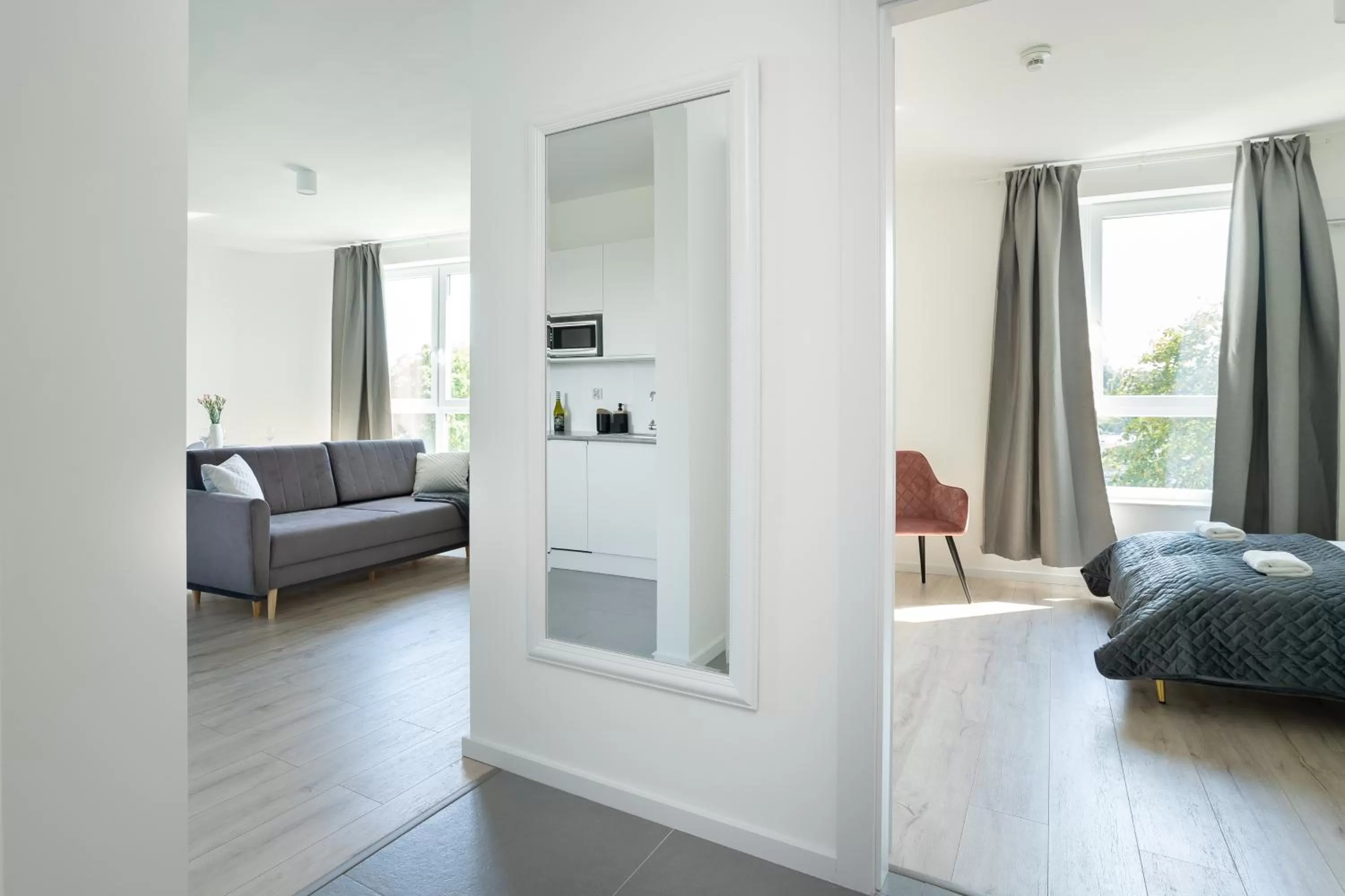 Bed in Symphony Modern Tower Apartamenty