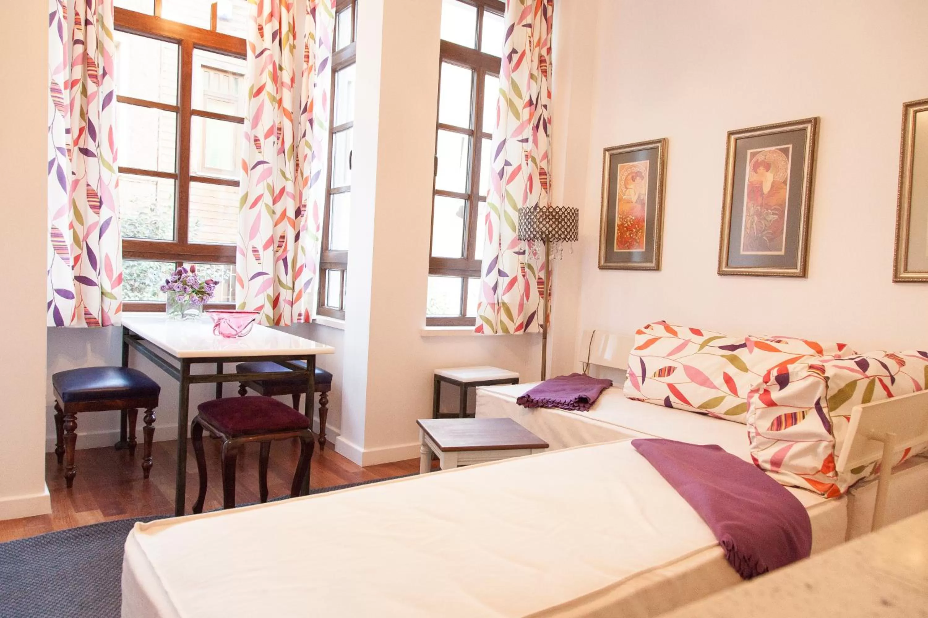 Living room, Bed in Villa Pera Suite Hotel