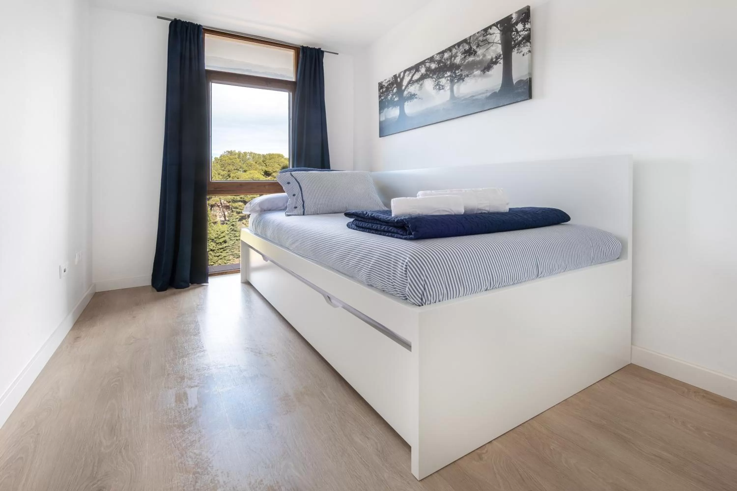 Bed in Agaró Cambrils Apartments