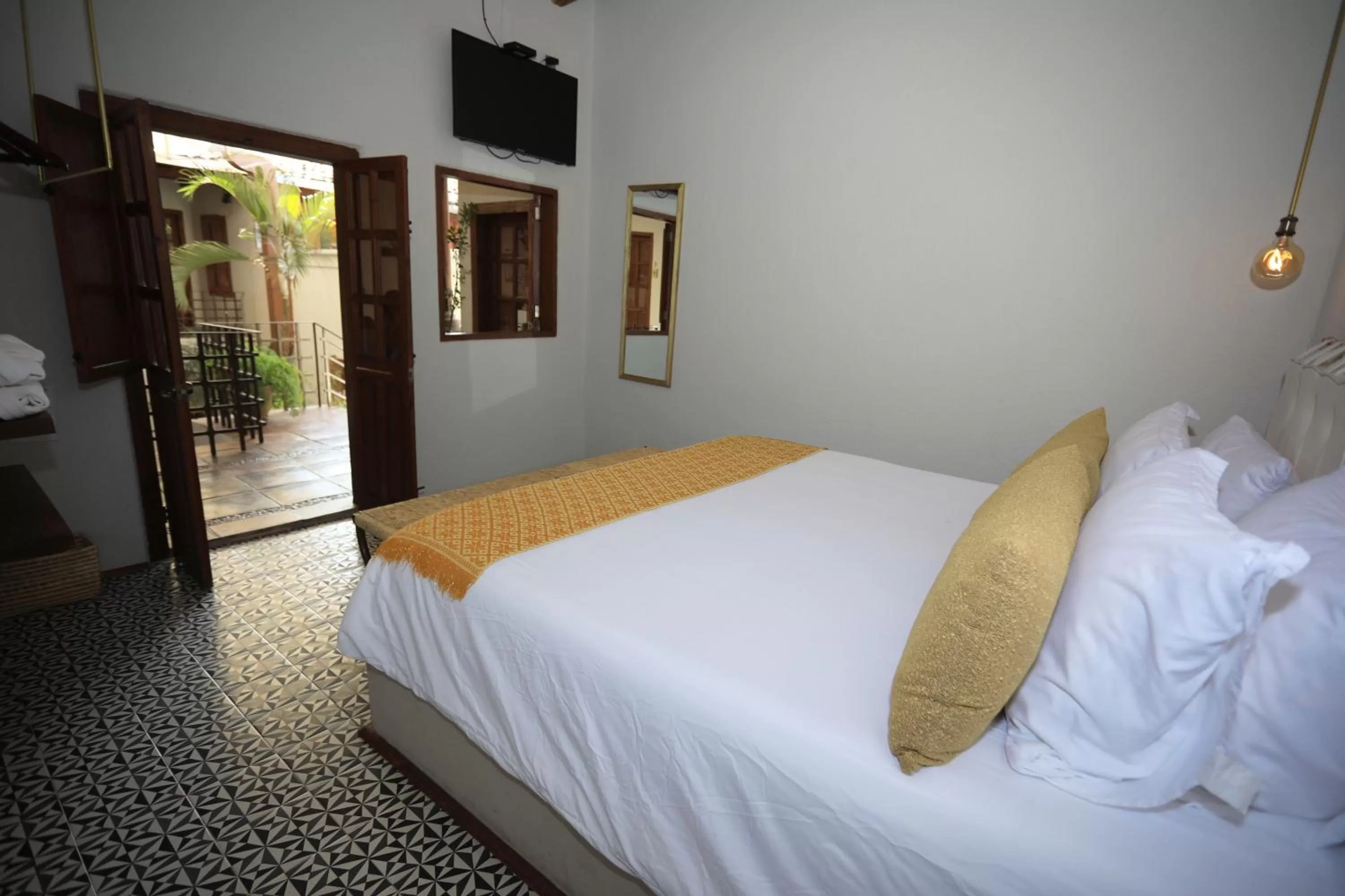 Photo of the whole room, Bed in La Dorada Town view