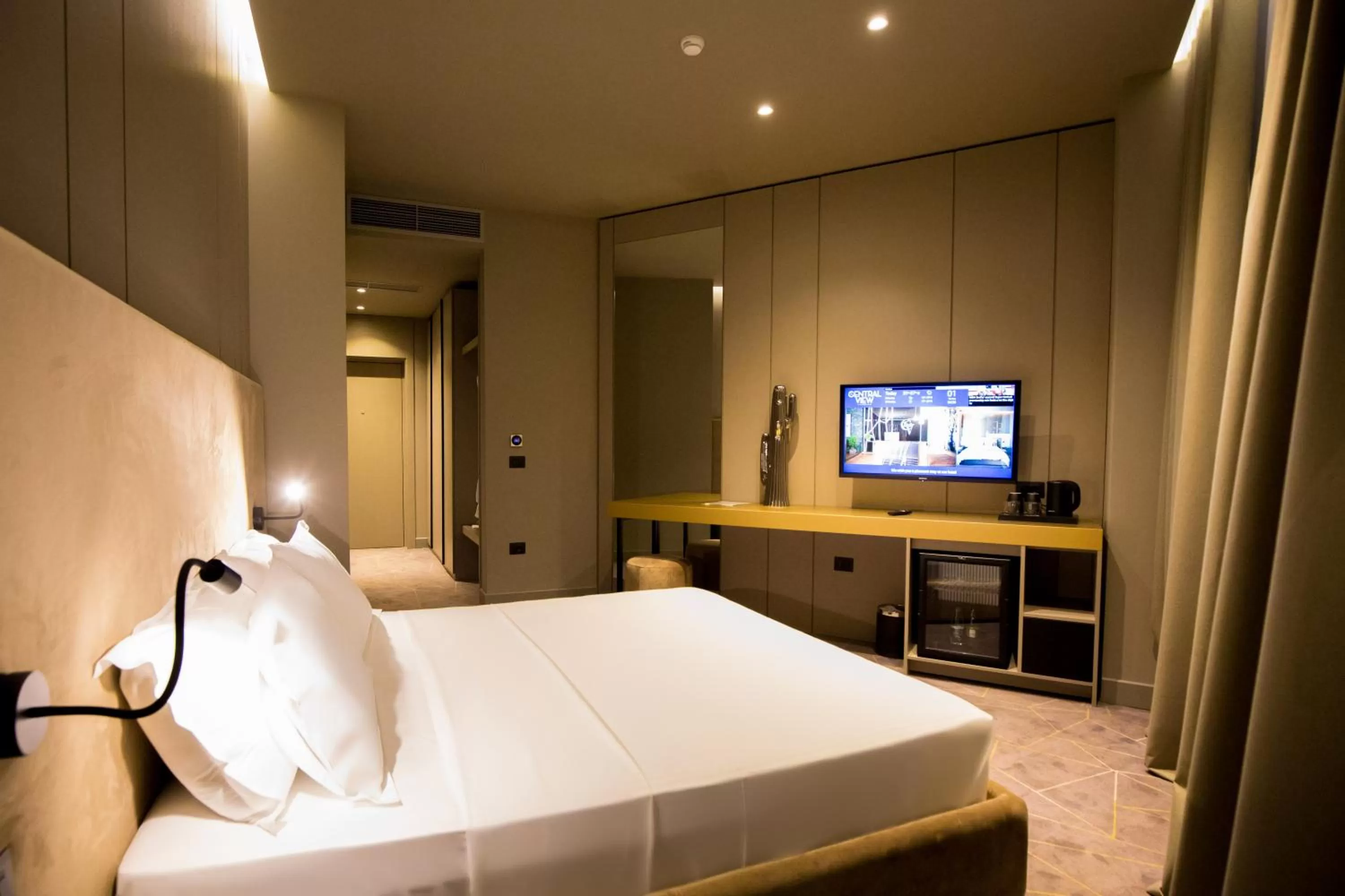 Bed in The Central View Boutique Hotel