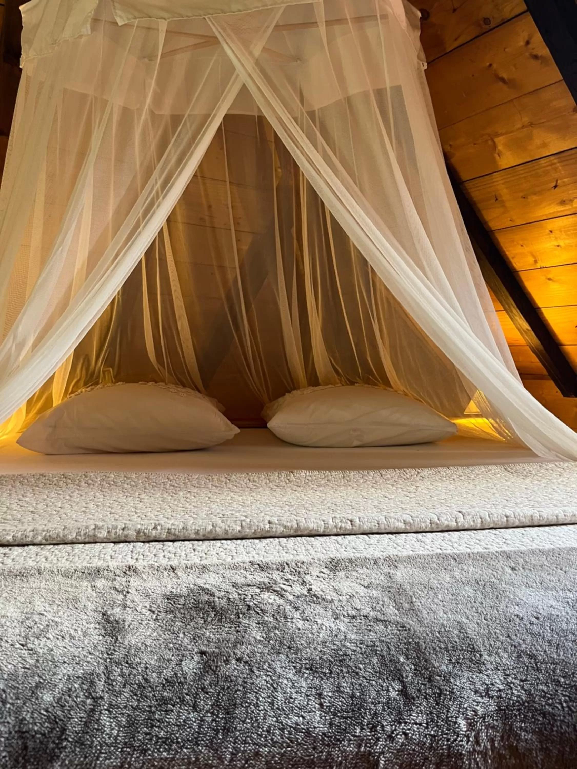 Bed in Habitation La Reine du Camp Chambres d'Hôtes