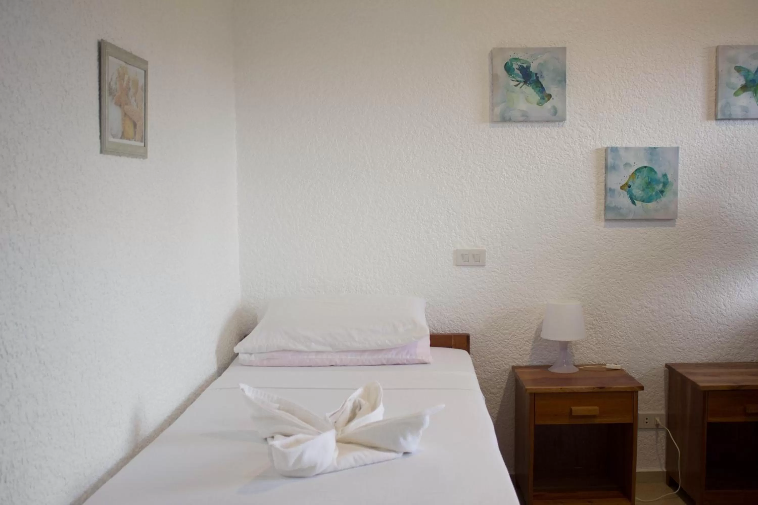 Bed in Jugalis Hotel and Restaurant