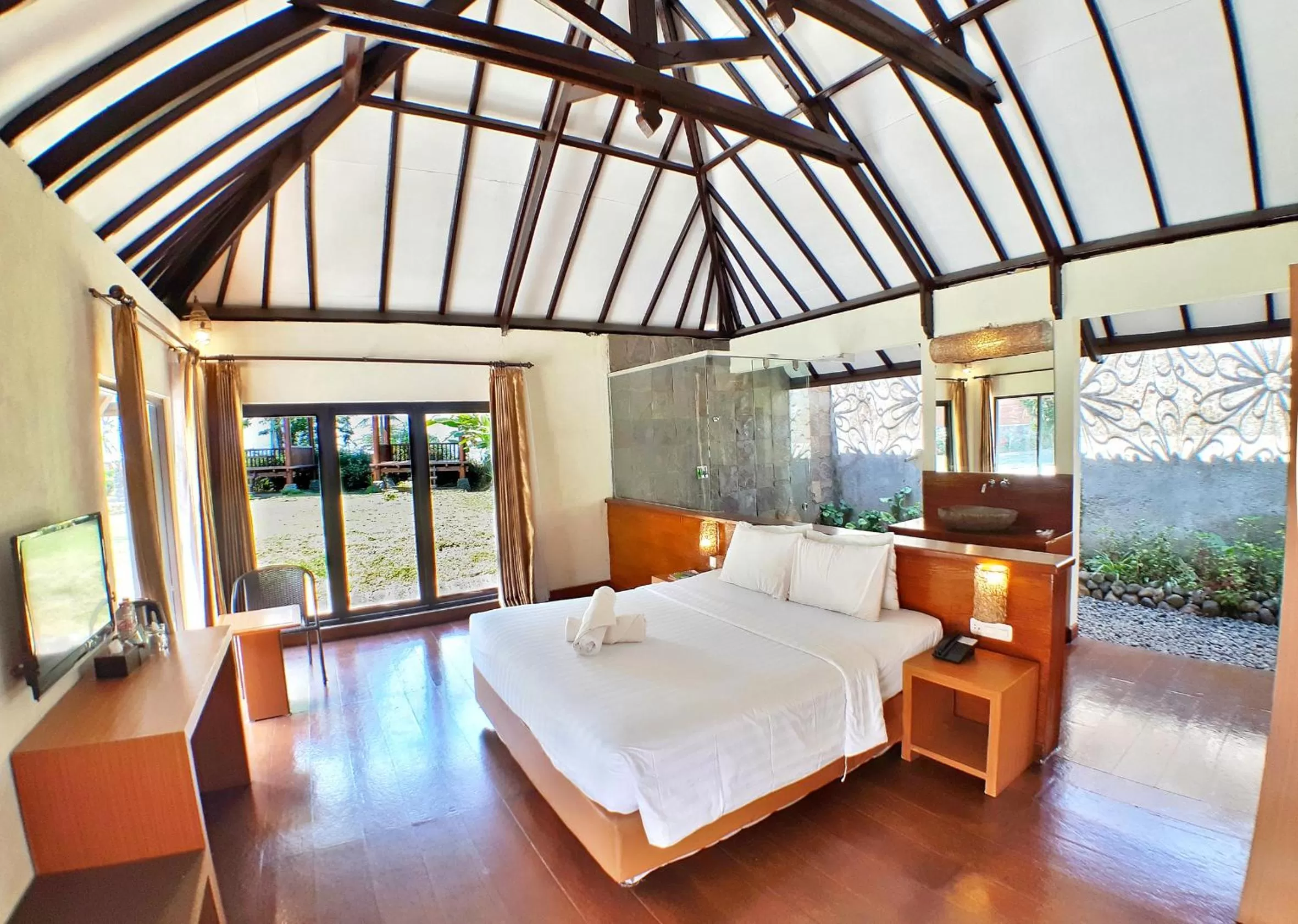 Bed in The Batu Hotel & Villas
