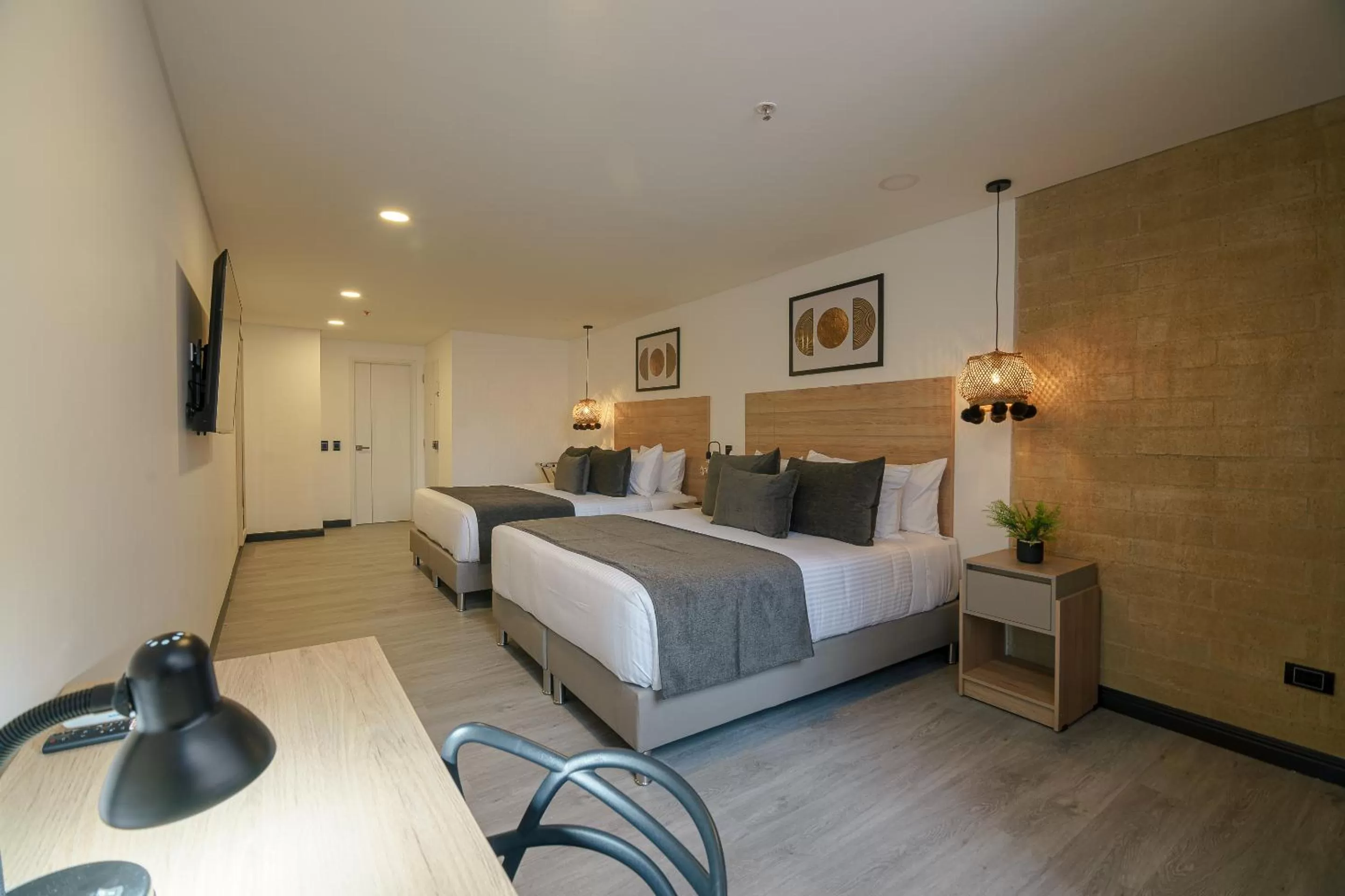 Photo of the whole room, Bed in First Class Hotel