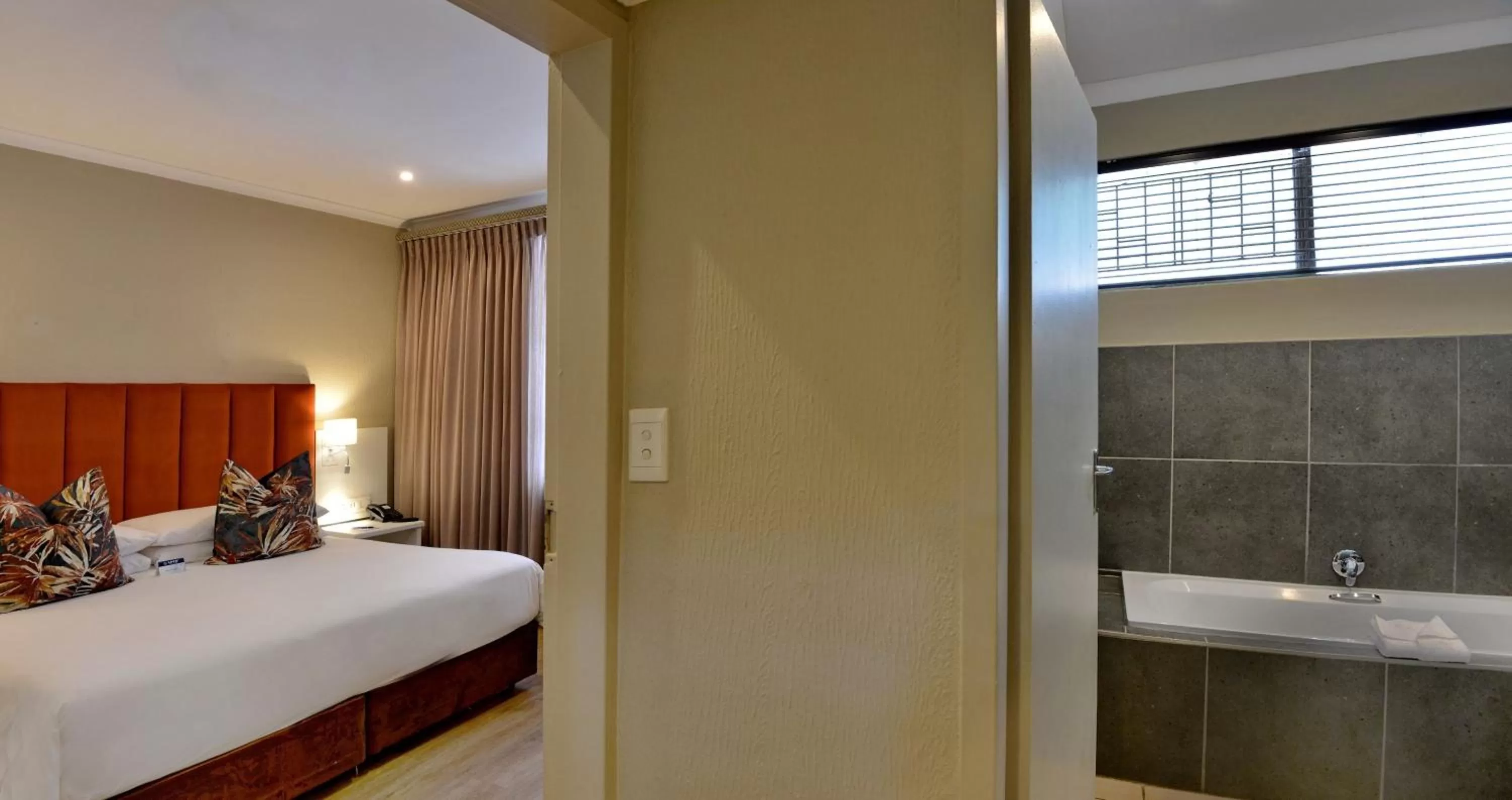 Bathroom, Bed in ANEW Resort Hunters Rest Rustenburg