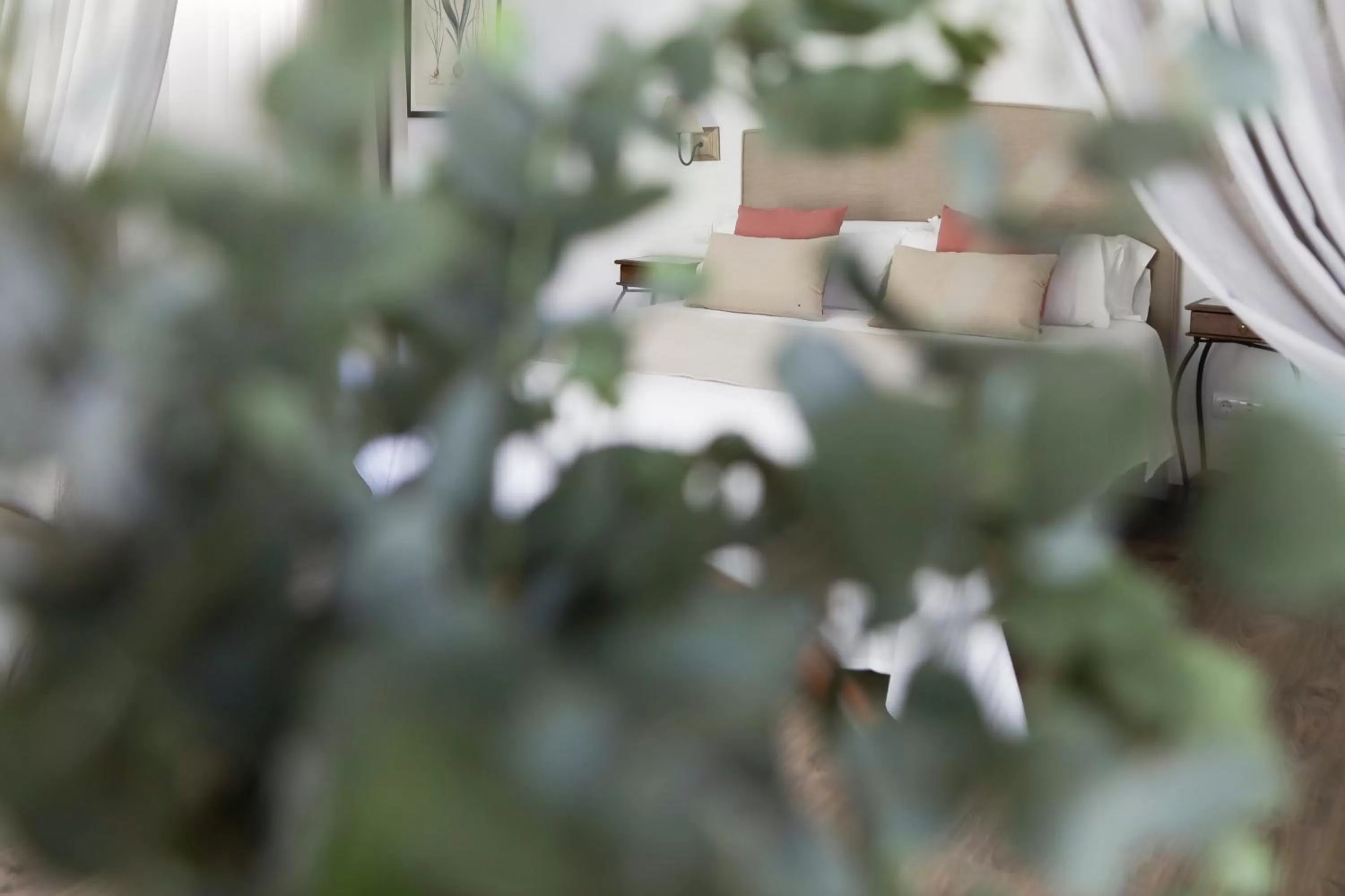 Bed in Le Petit Boutique Hotel