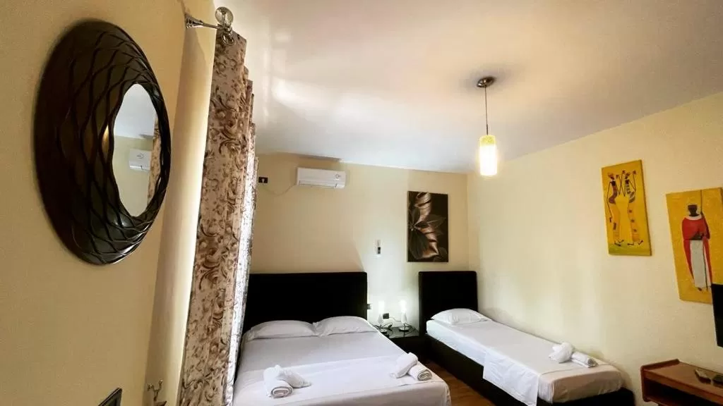 Bed in Hotel Ambasador