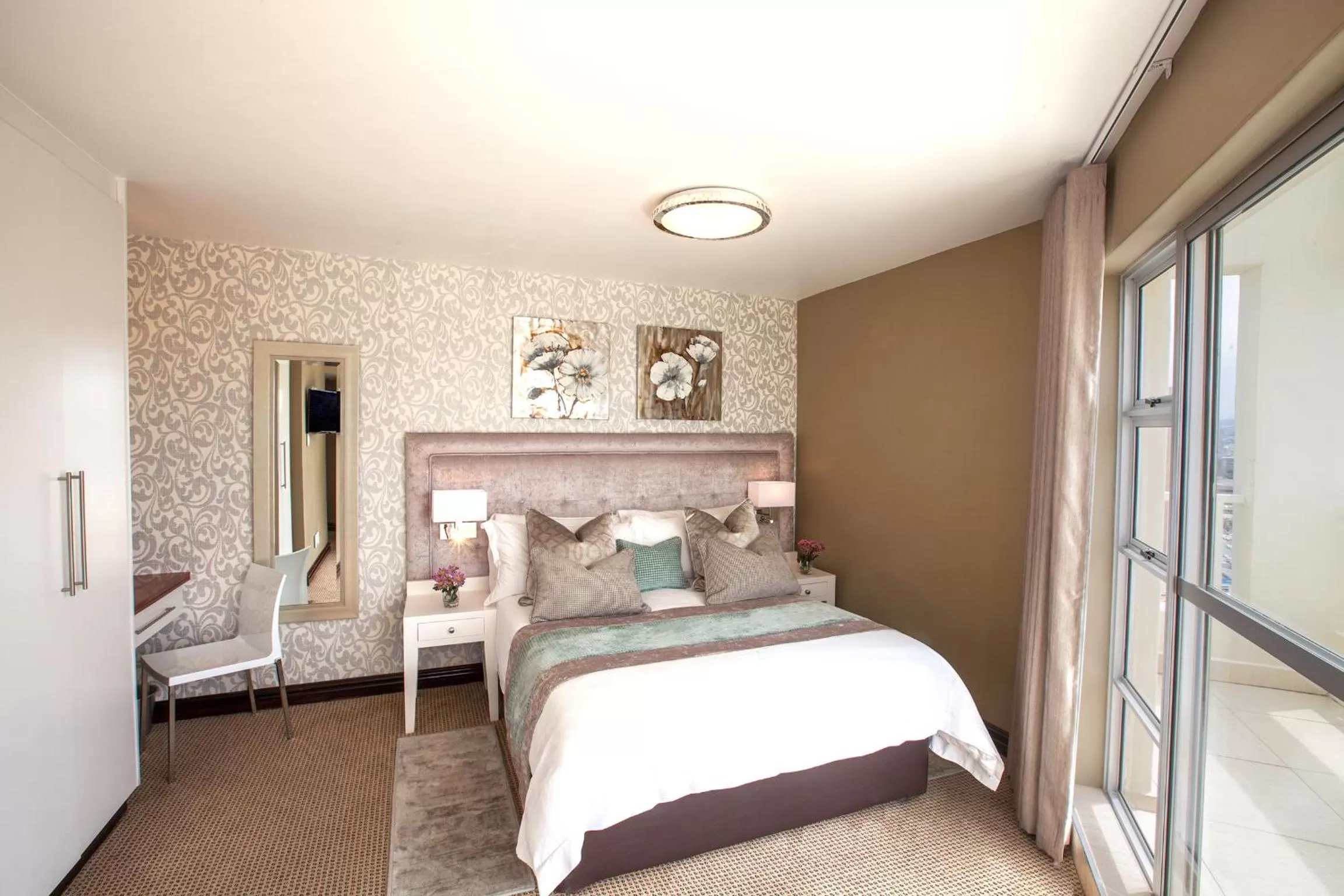 Bed in First Group The Palace All-Suite