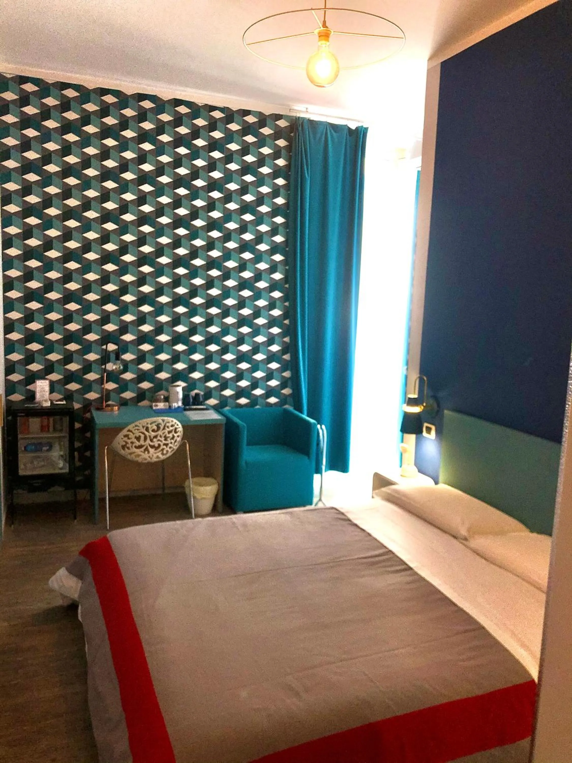 Bed in H Rooms boutique Hotel