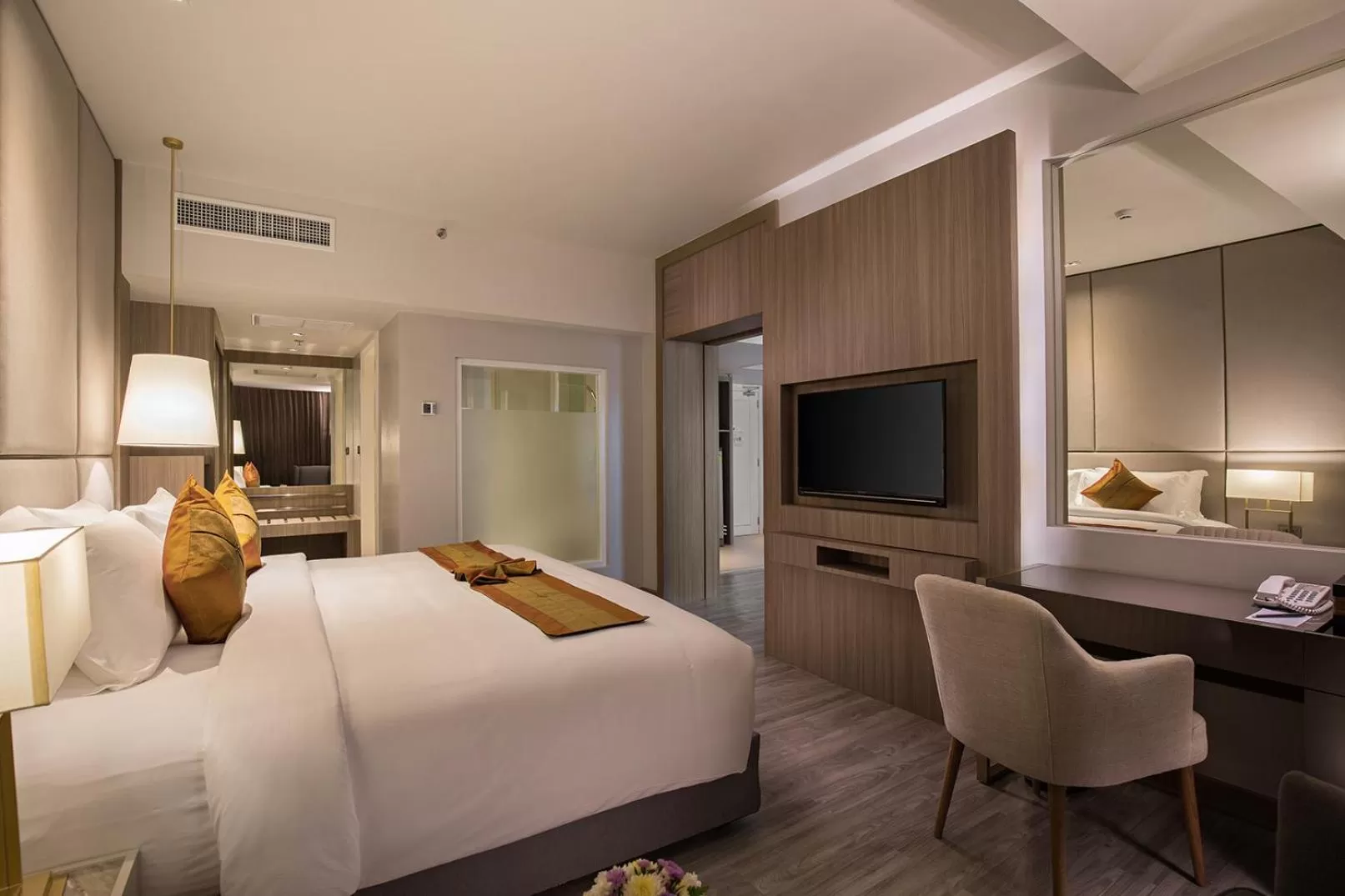 Bed in The Heritage Chiang Rai Hotel and Convention