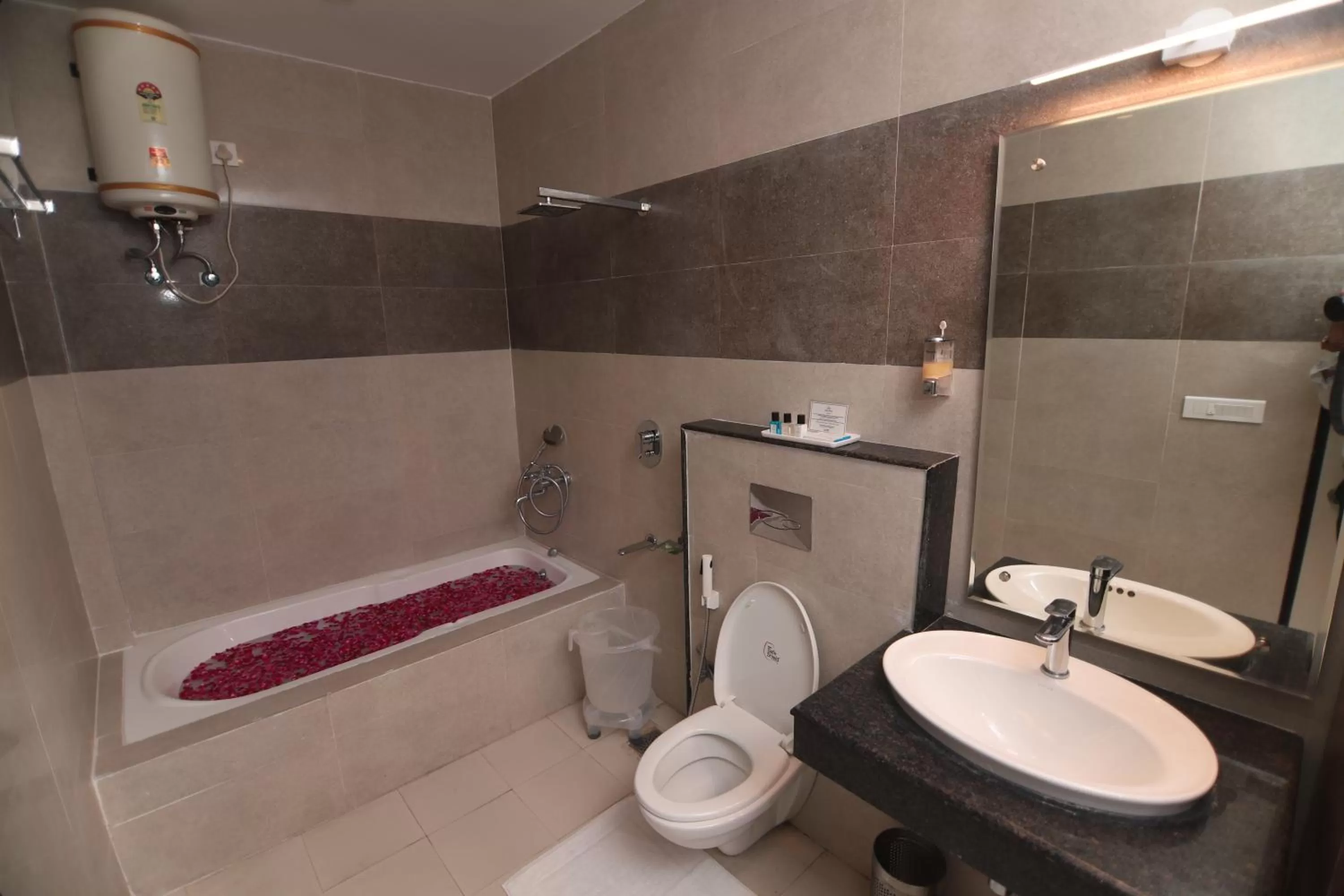 Bathroom in Indira Nikunj Rubystone Exotic