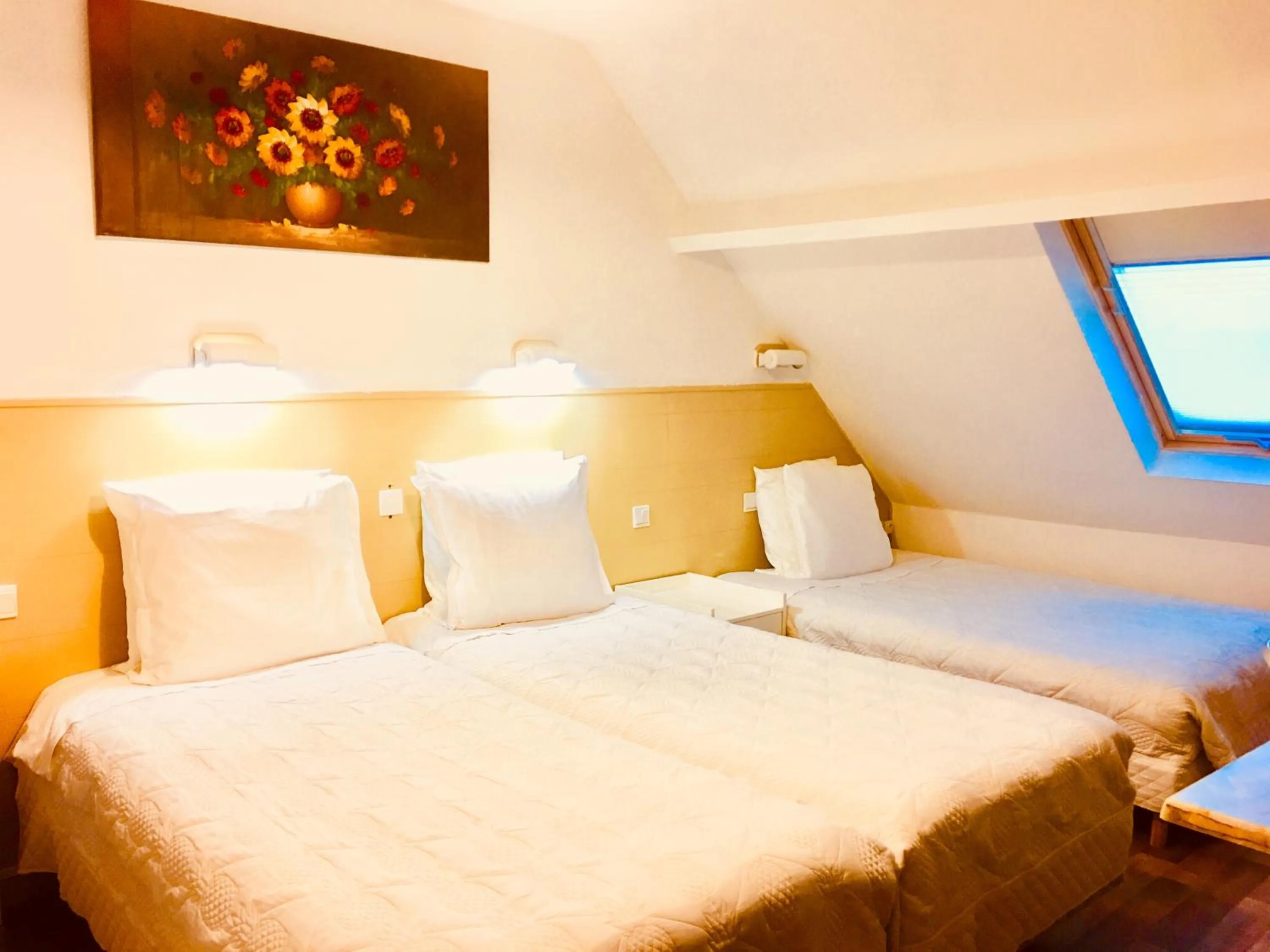 Bed in Hotel Paris Star