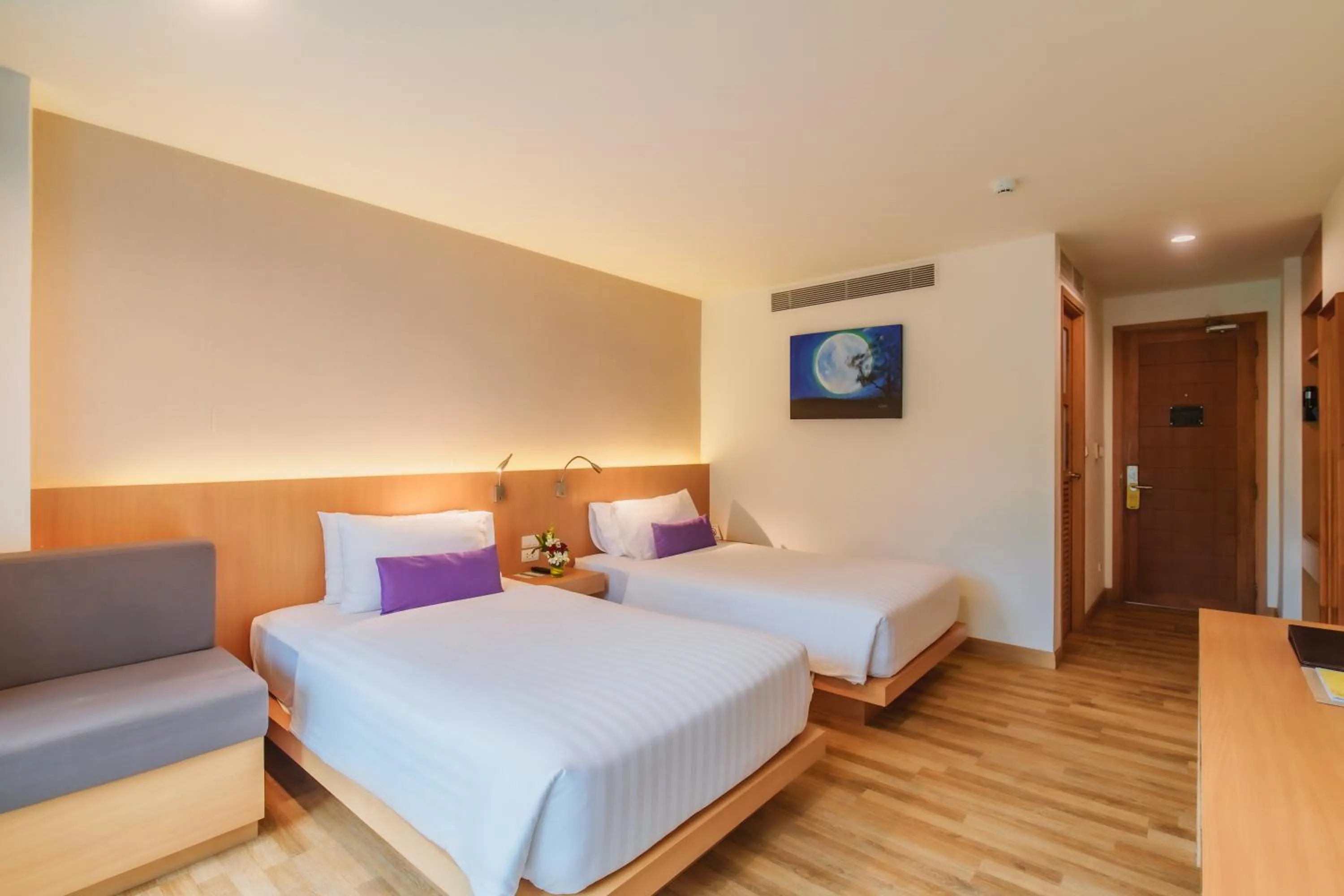 Photo of the whole room, Bed in The Lunar Patong