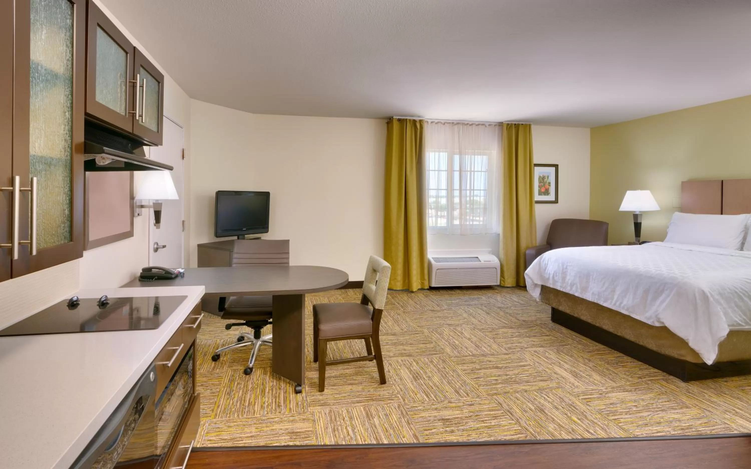 Photo of the whole room, Bed in Candlewood Suites Plano East by IHG