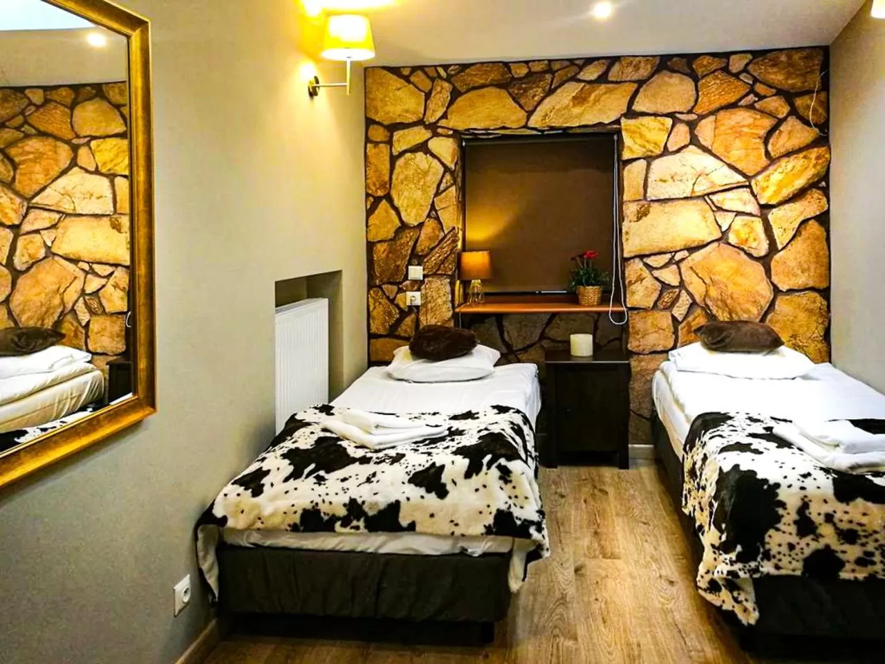 Bed in GRONO Apartamenty