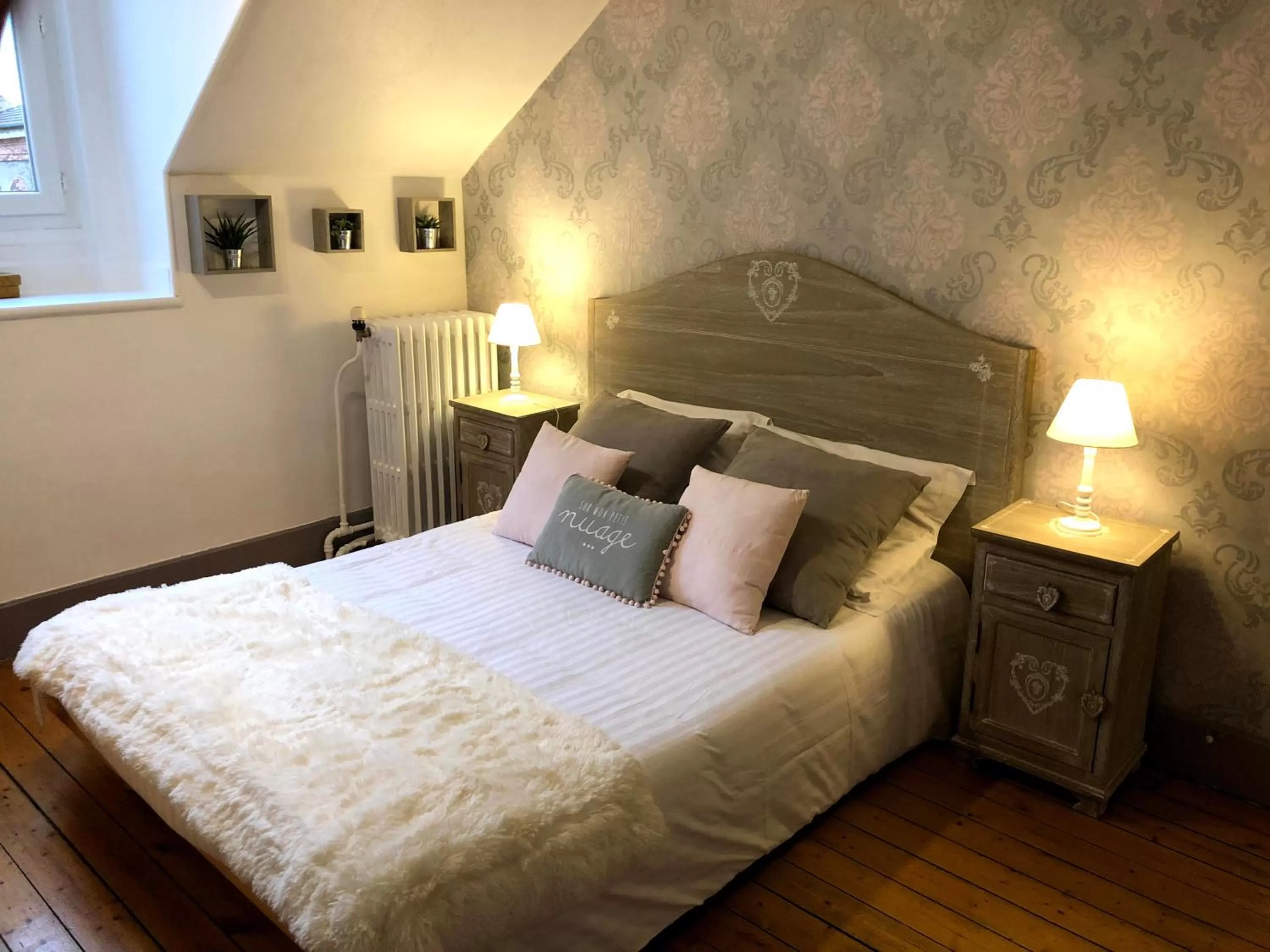 Bed in Logis Hotel La Tourelle du Beffroi