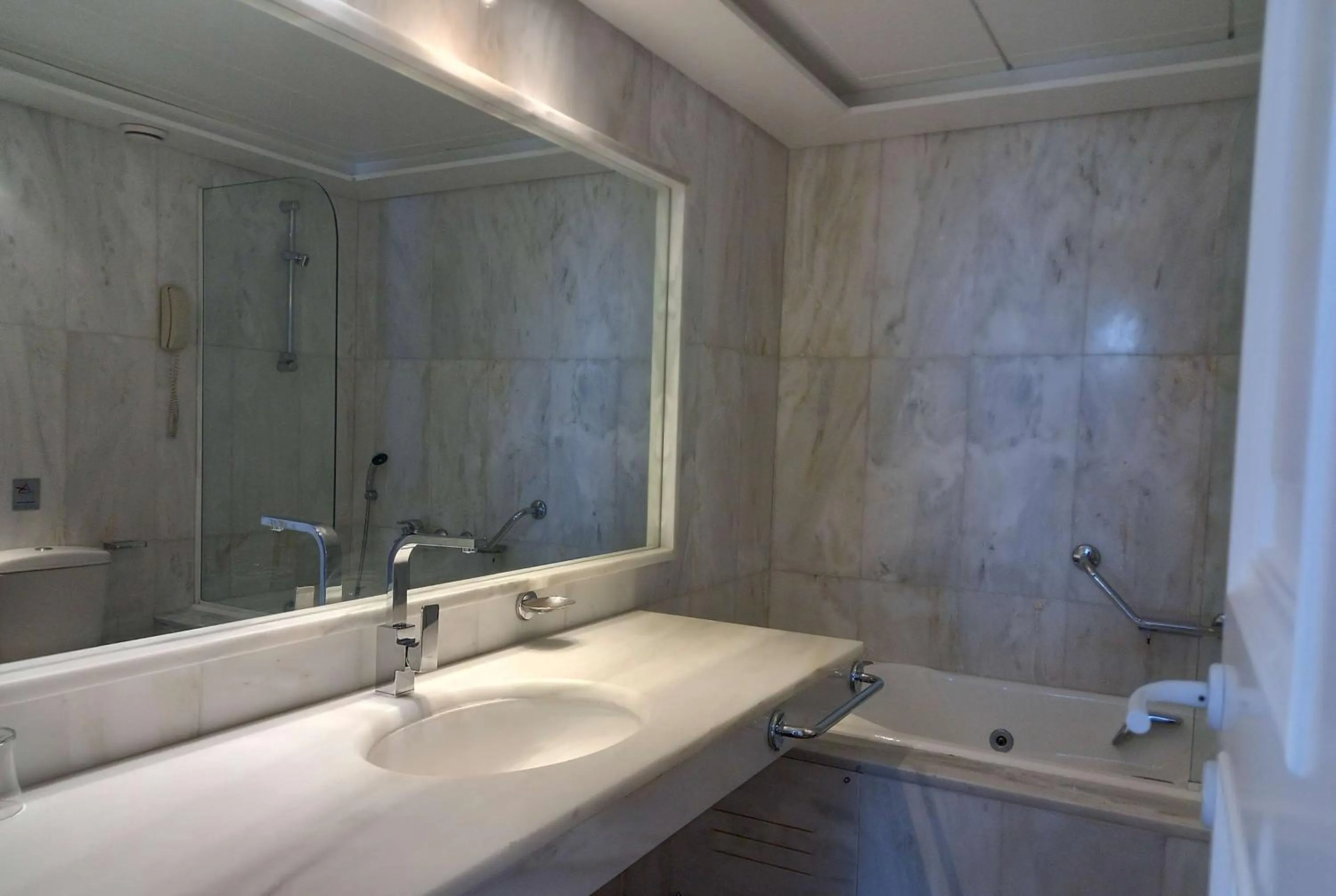 Bathroom in Ramada Loutraki Poseidon Resort