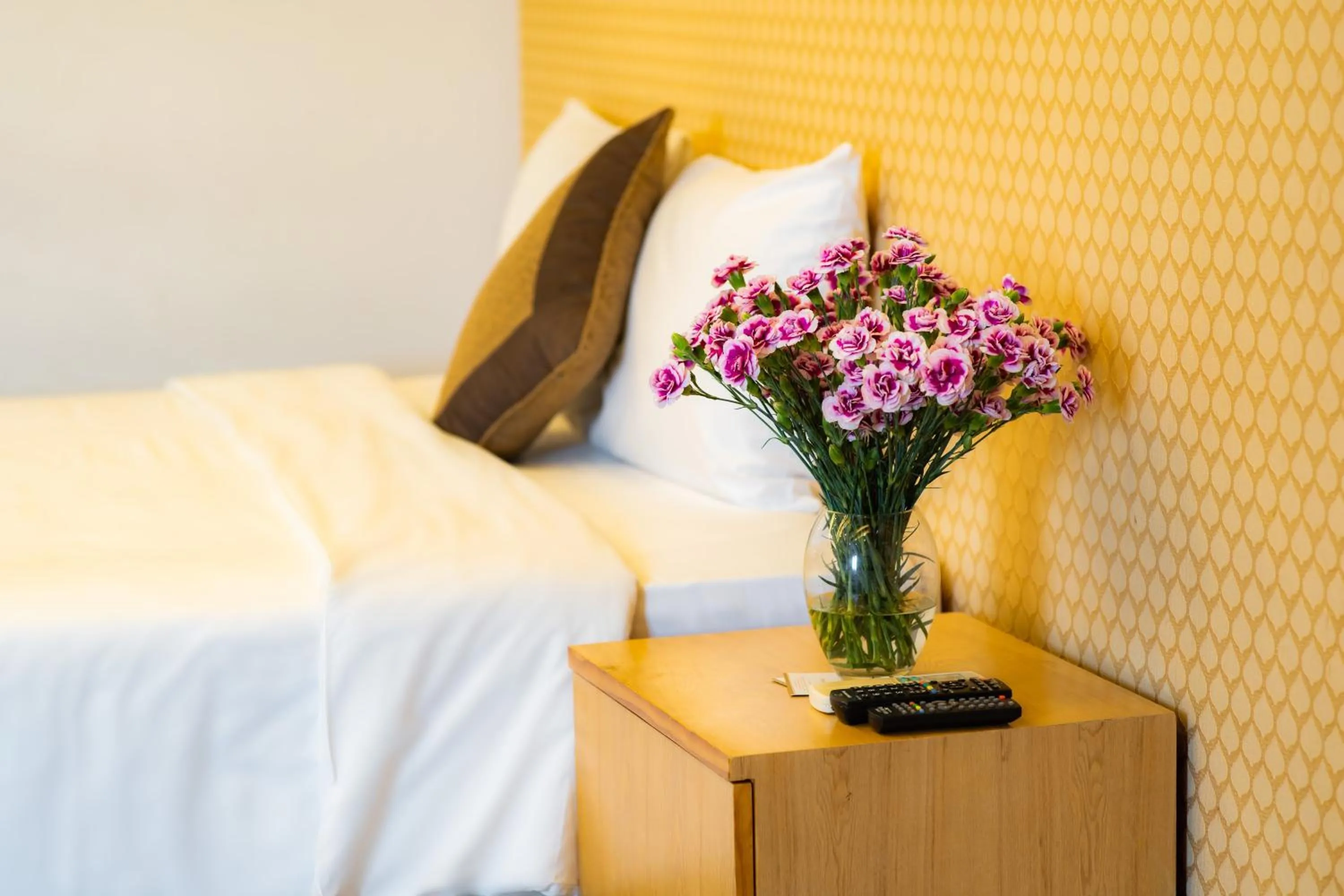 Bed in Riverside Hanoi Hotel