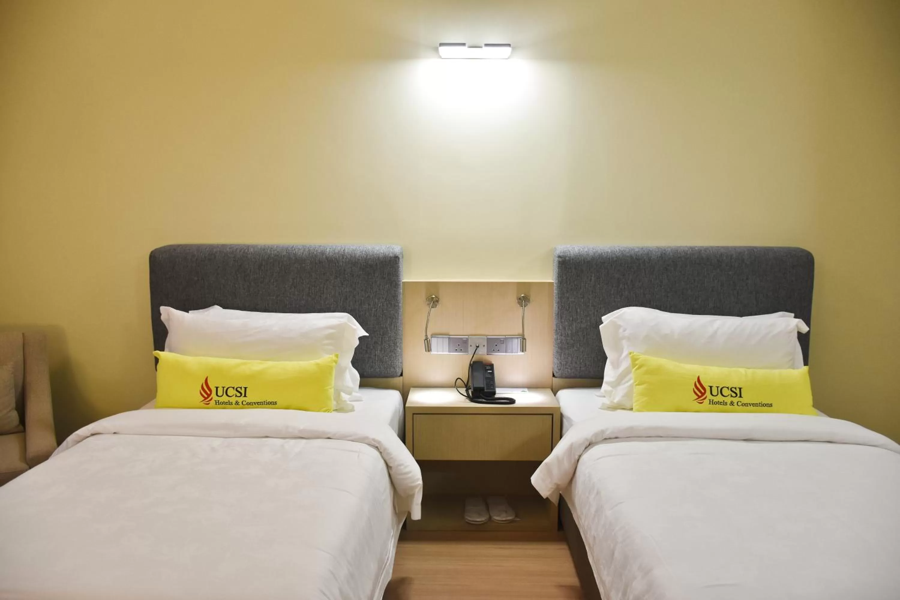 Photo of the whole room, Bed in UCSI Hotel Kuching