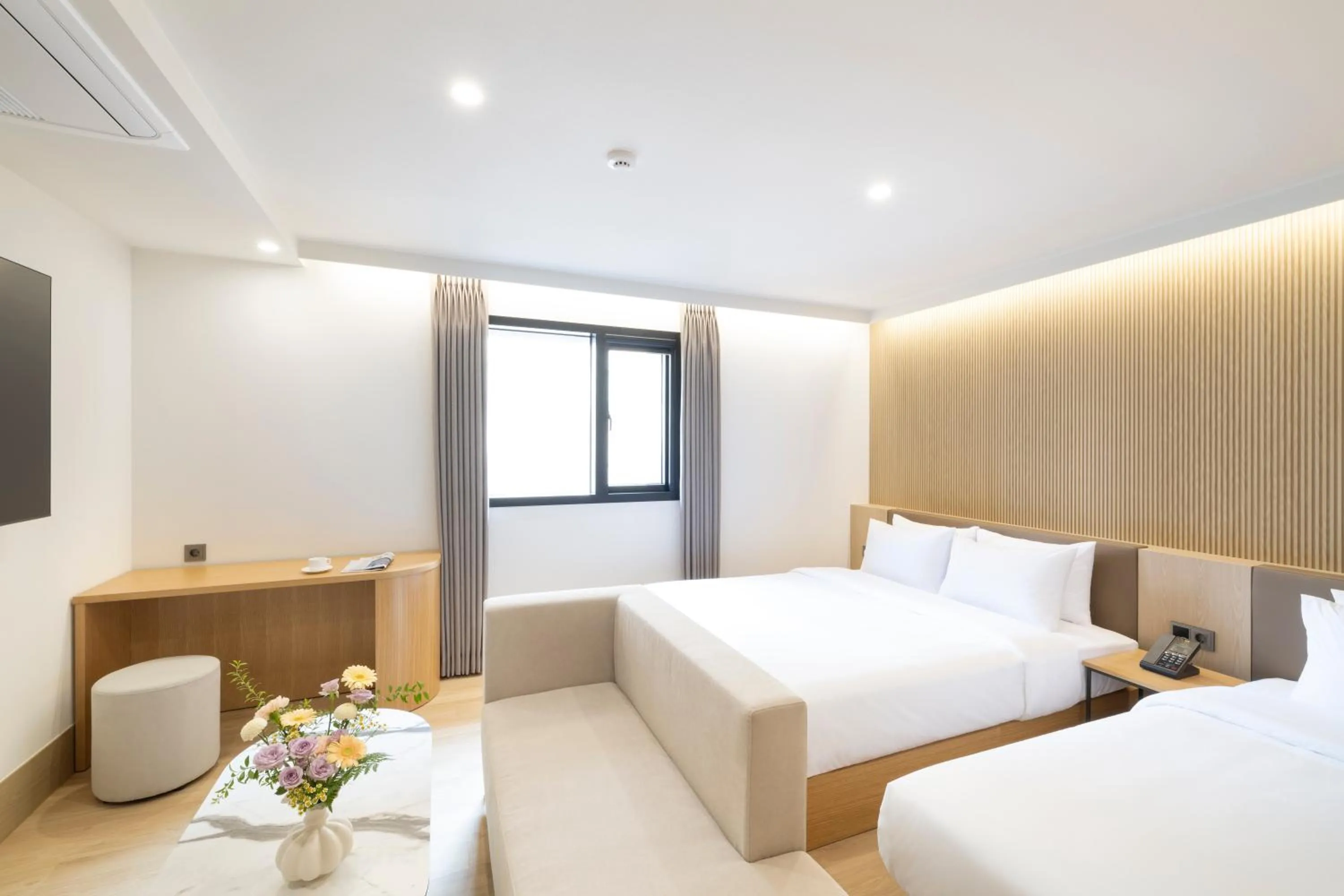 Bed in Jjak Boutique Hotel