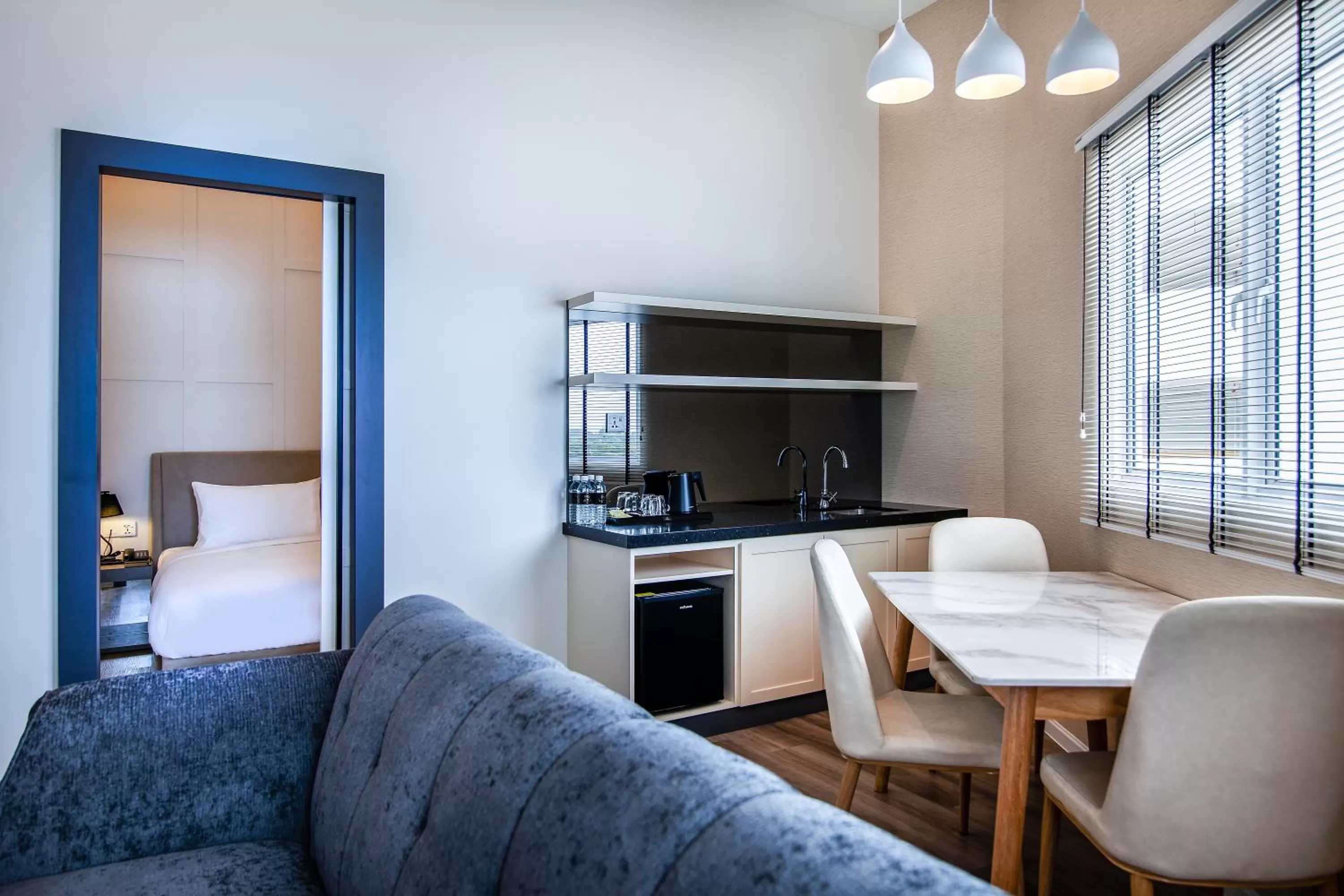 Living room, Bed in Wesley Hotel