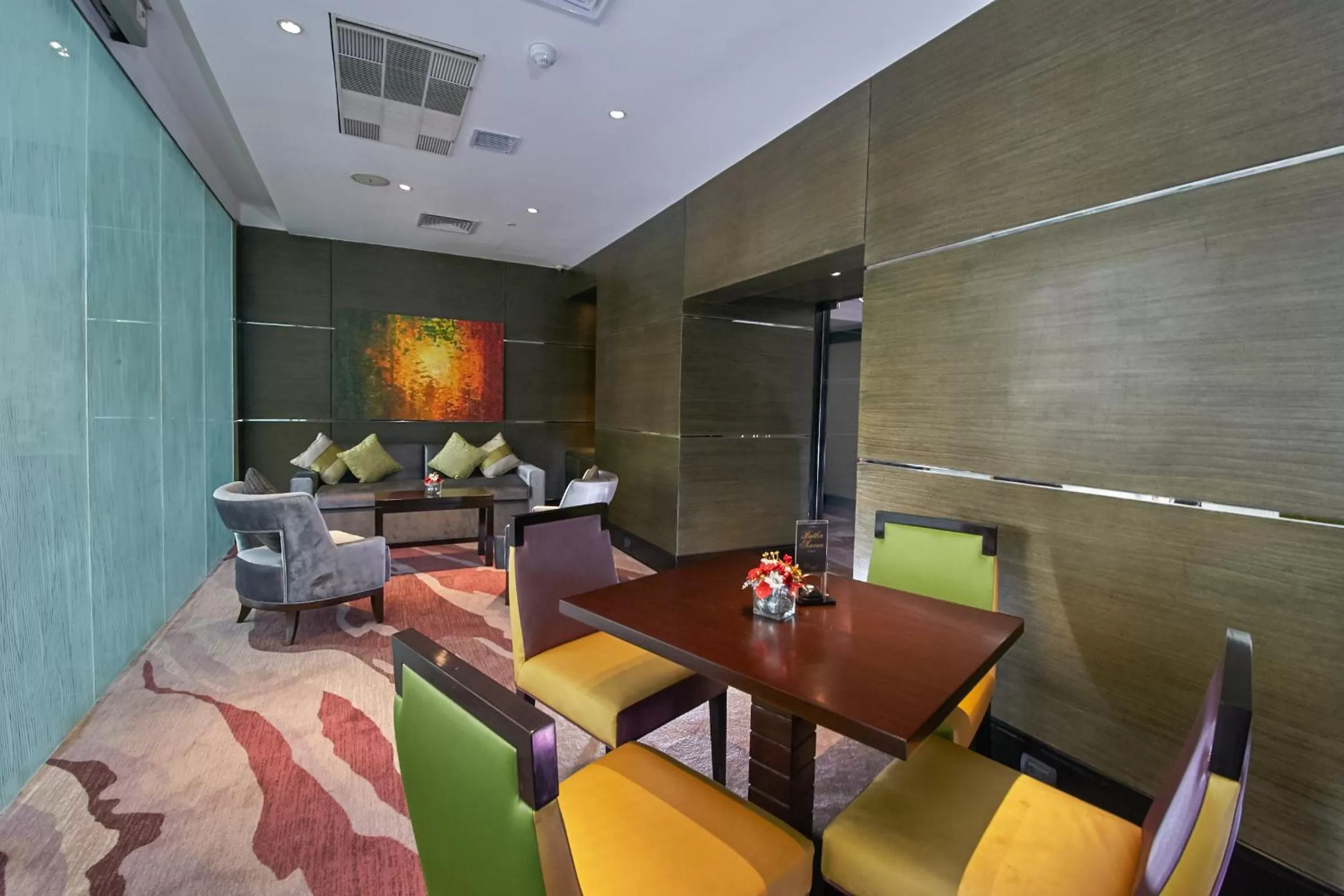 Communal lounge/ TV room in Diamond Hotel Philippines