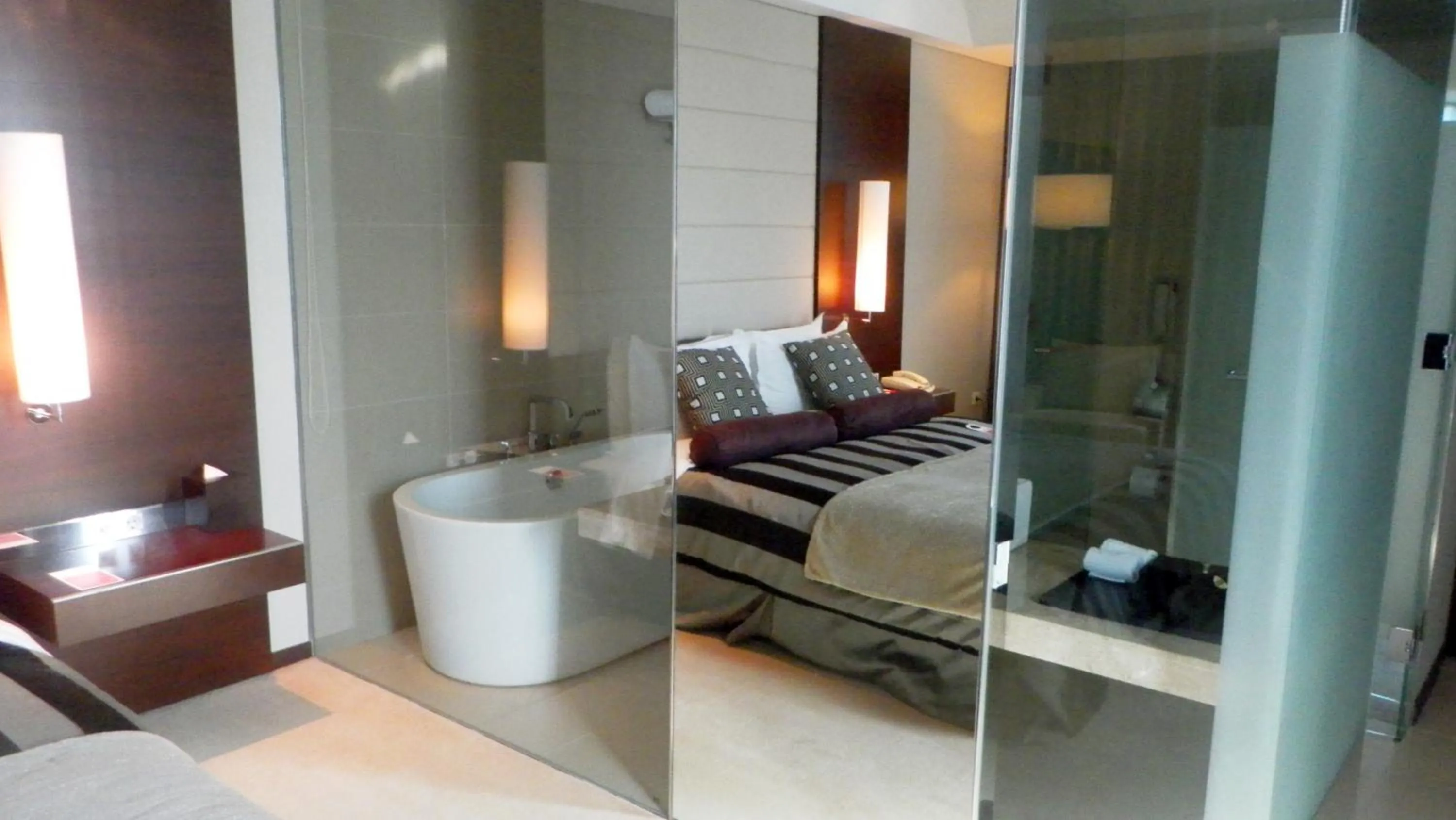 Bathroom, Bed in Ramada Plaza by Wyndham Suwon