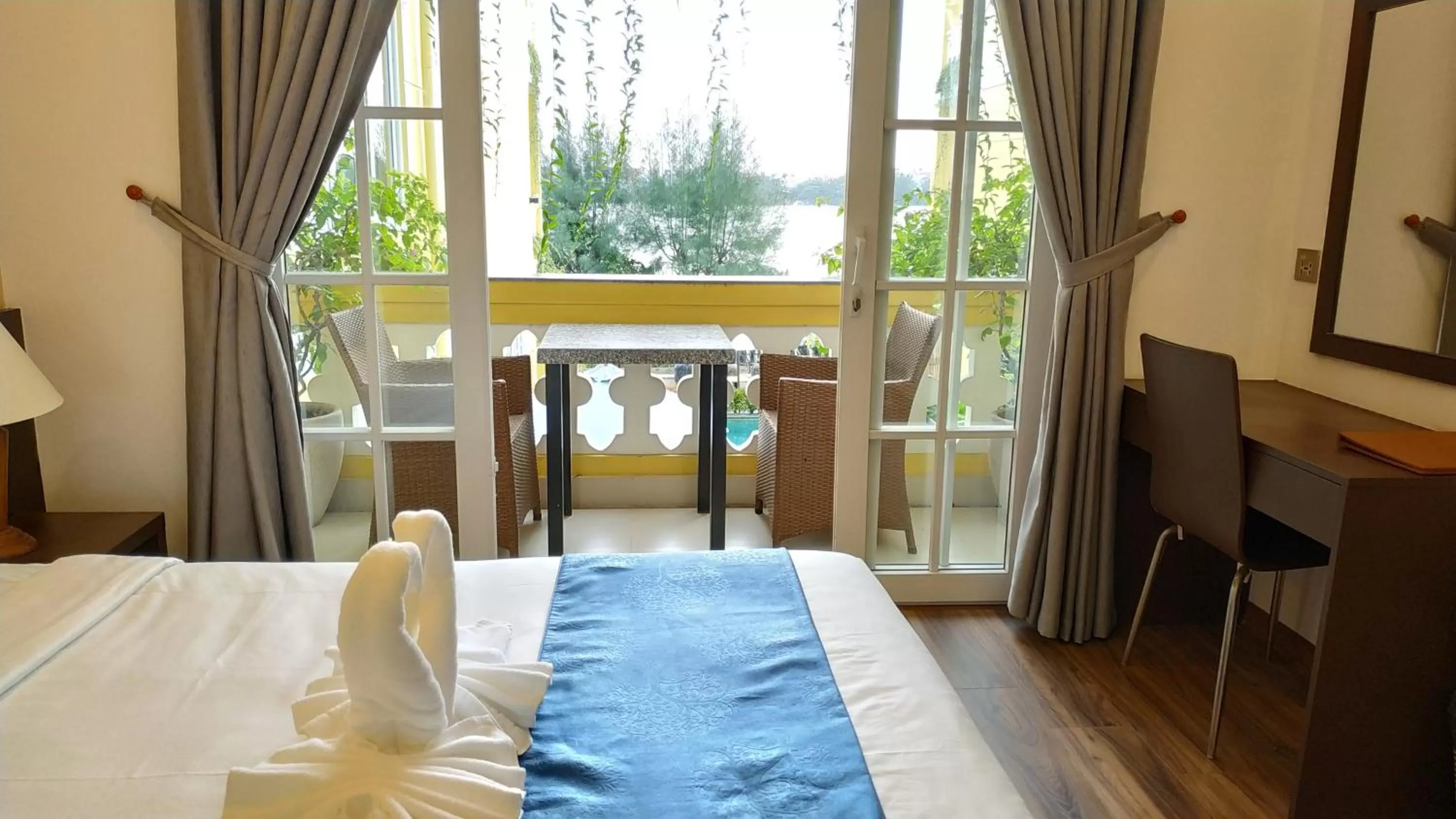 Living room, Bed in TRIPLE Riverside Villa Hotel HoiAn