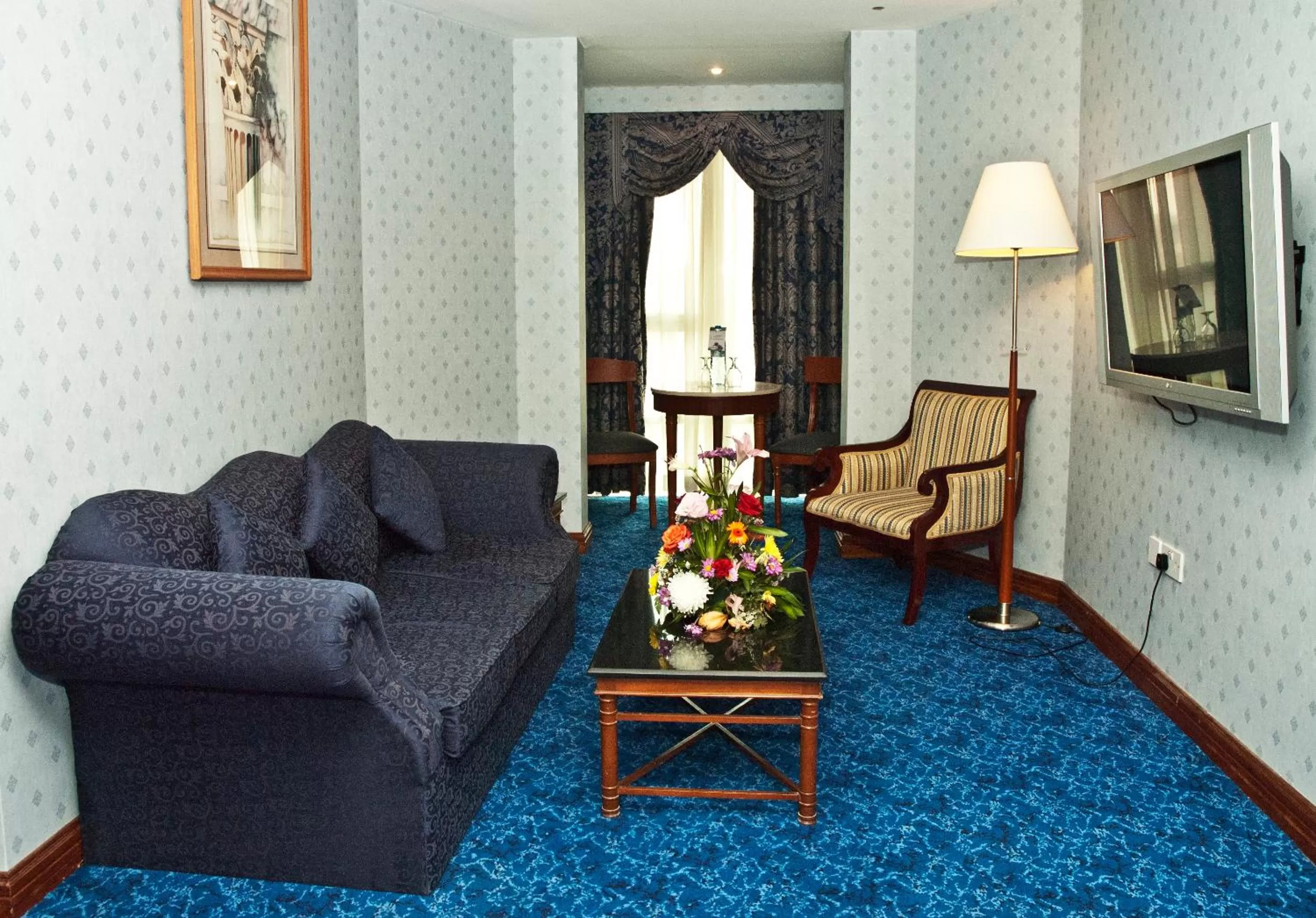 Seating area in Regent Palace Hotel
