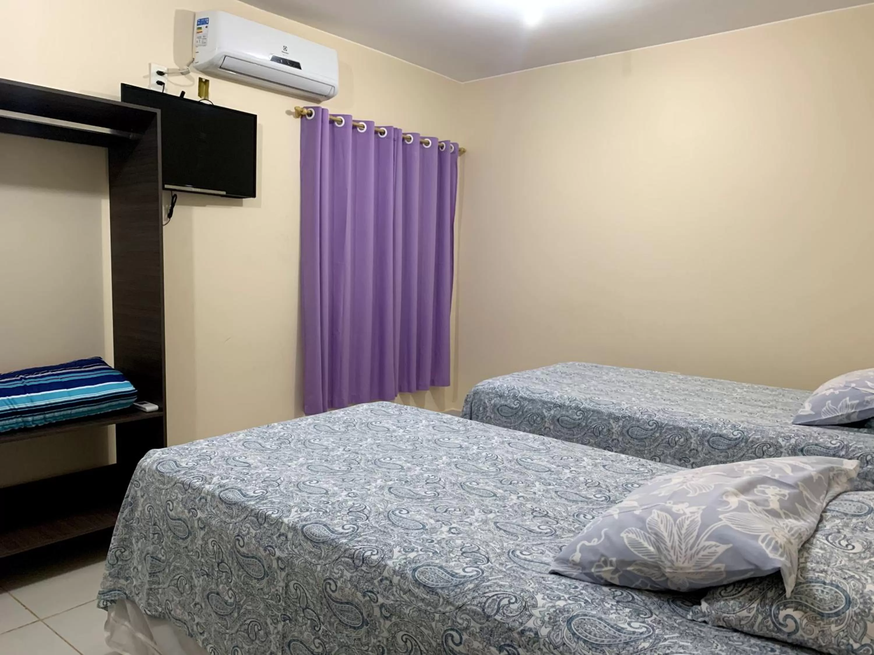 Bed in Pousada Jardim Brasília