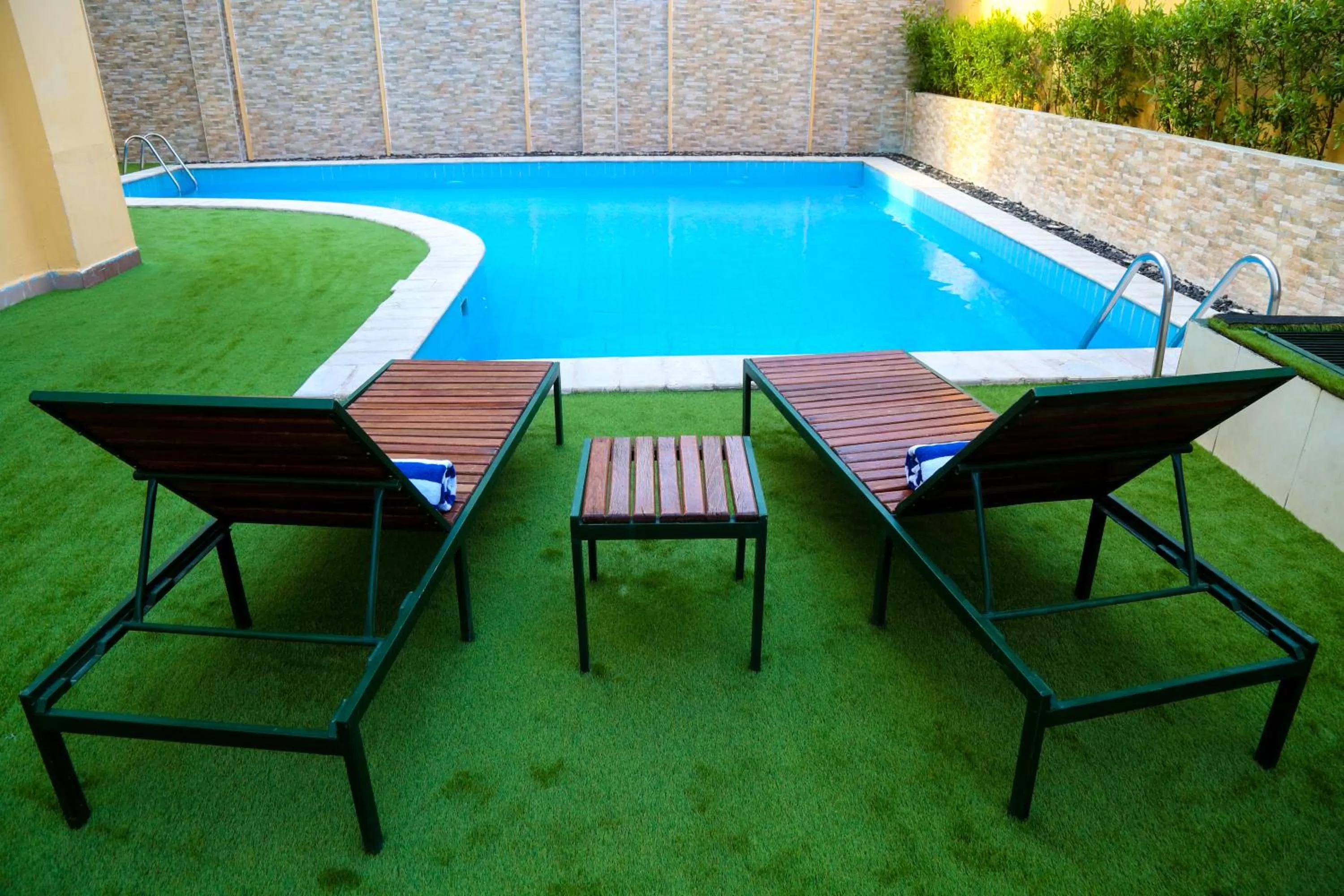 sunbed, Swimming Pool in Golden Tulip Aqaba