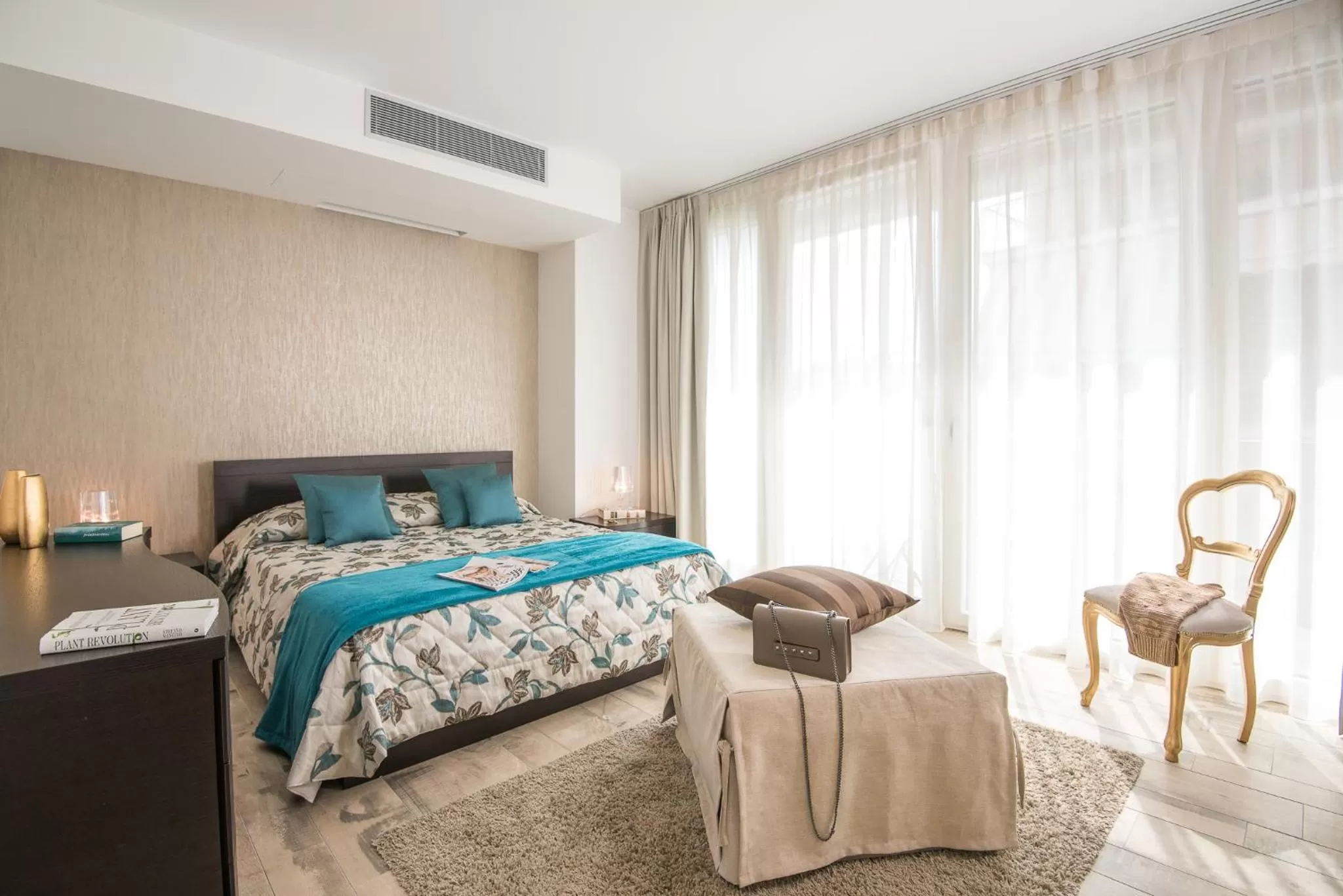 Bed in Rivetto Suites