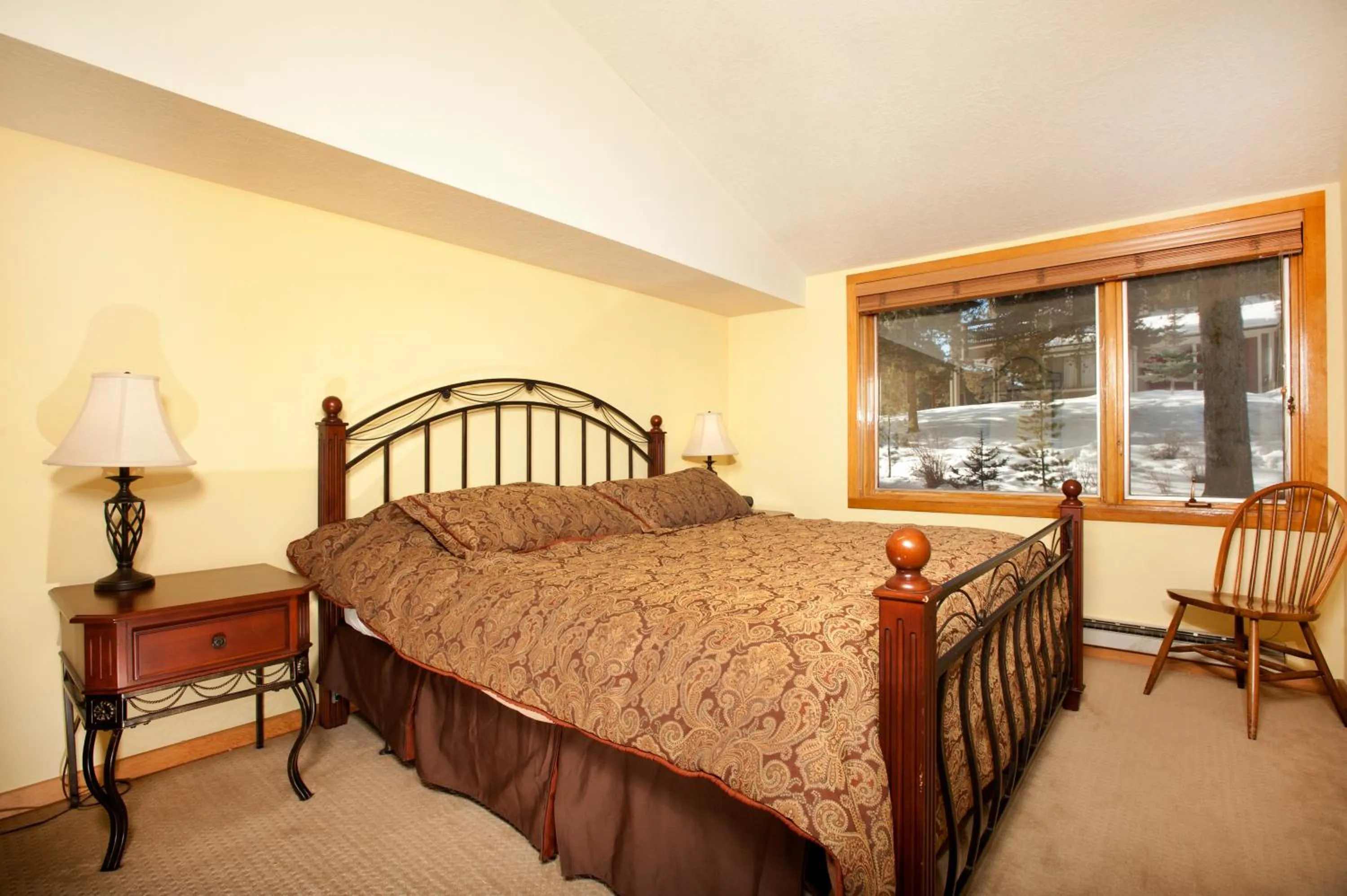 Bed in Evergreen Condominiums by Keystone Resort