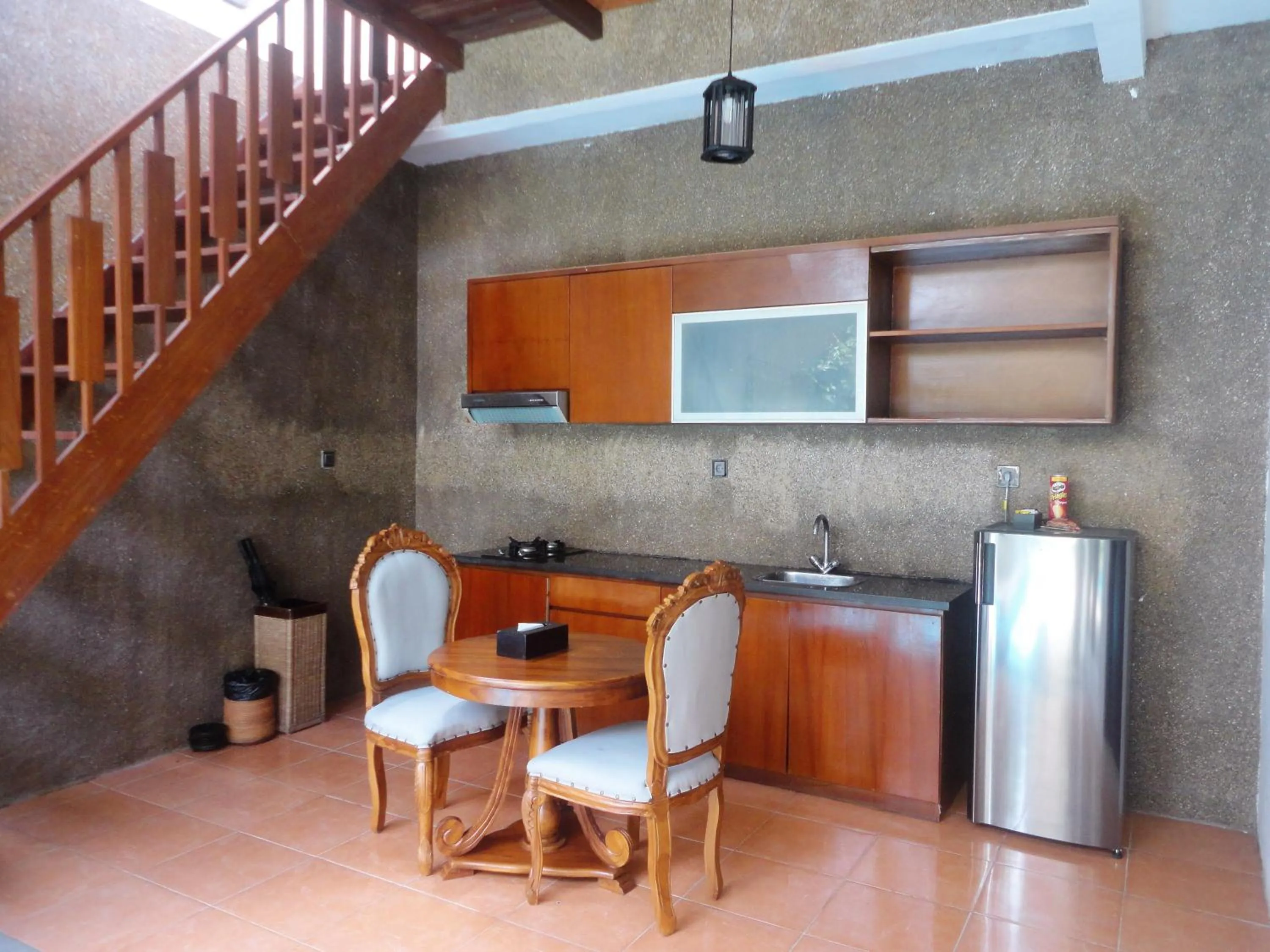 Kitchen or kitchenette in Ashoka Tree Resort at Tanggayuda