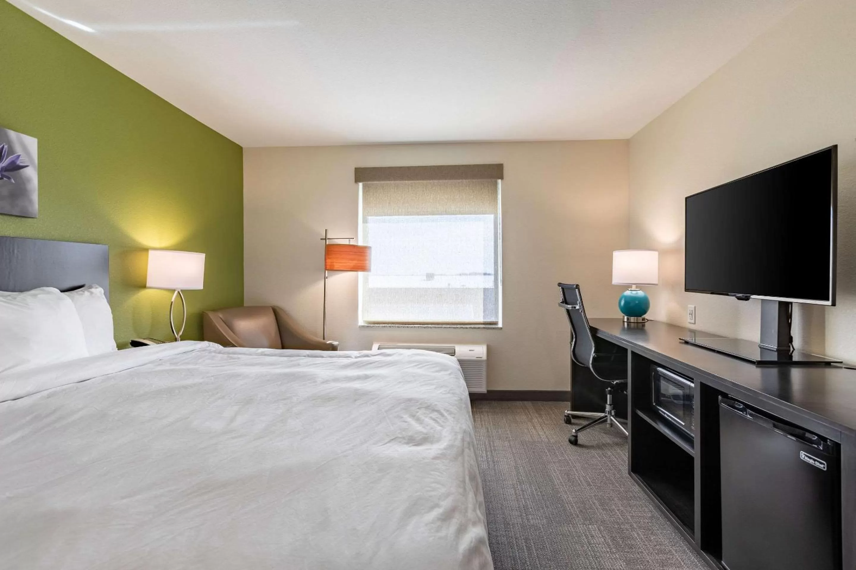 Photo of the whole room, Bed in Sleep Inn & Suites Mt Hope near Auction & Event Center