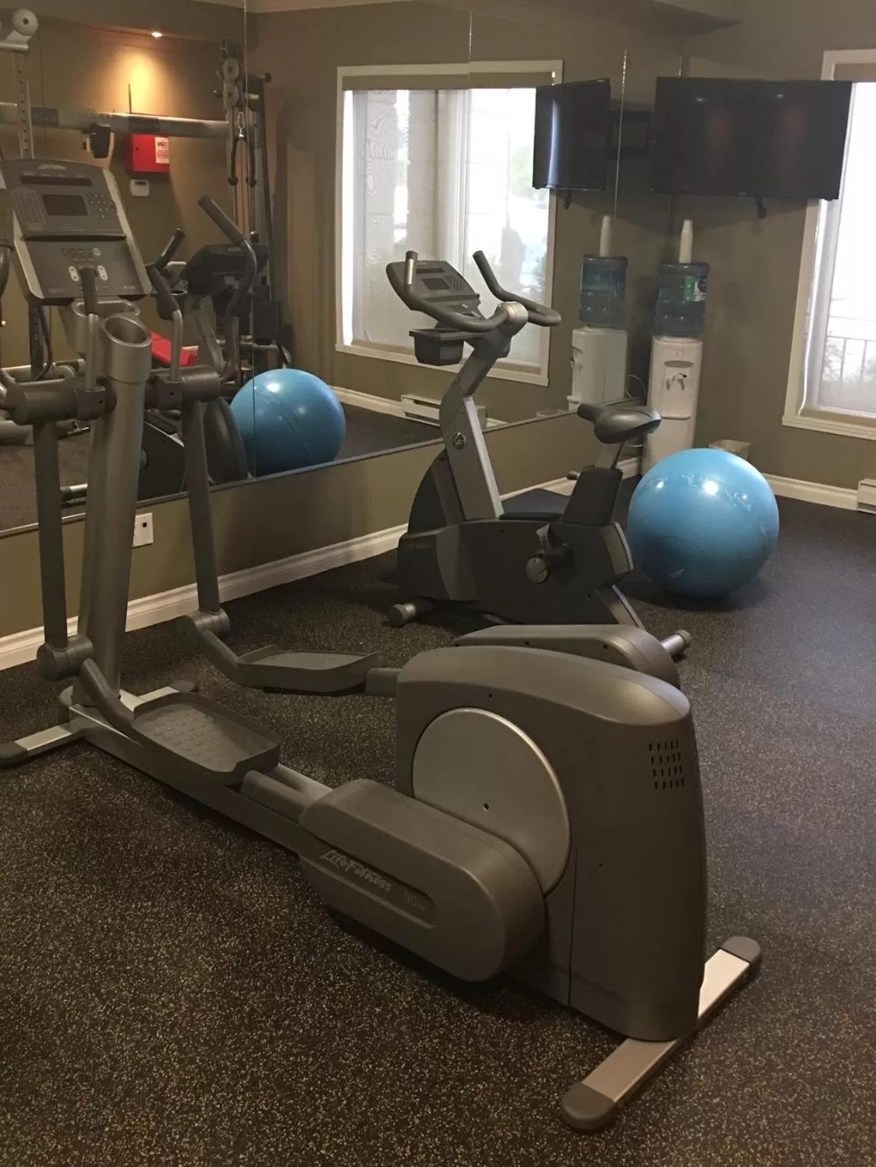 Fitness centre/facilities in Hotel Brossard