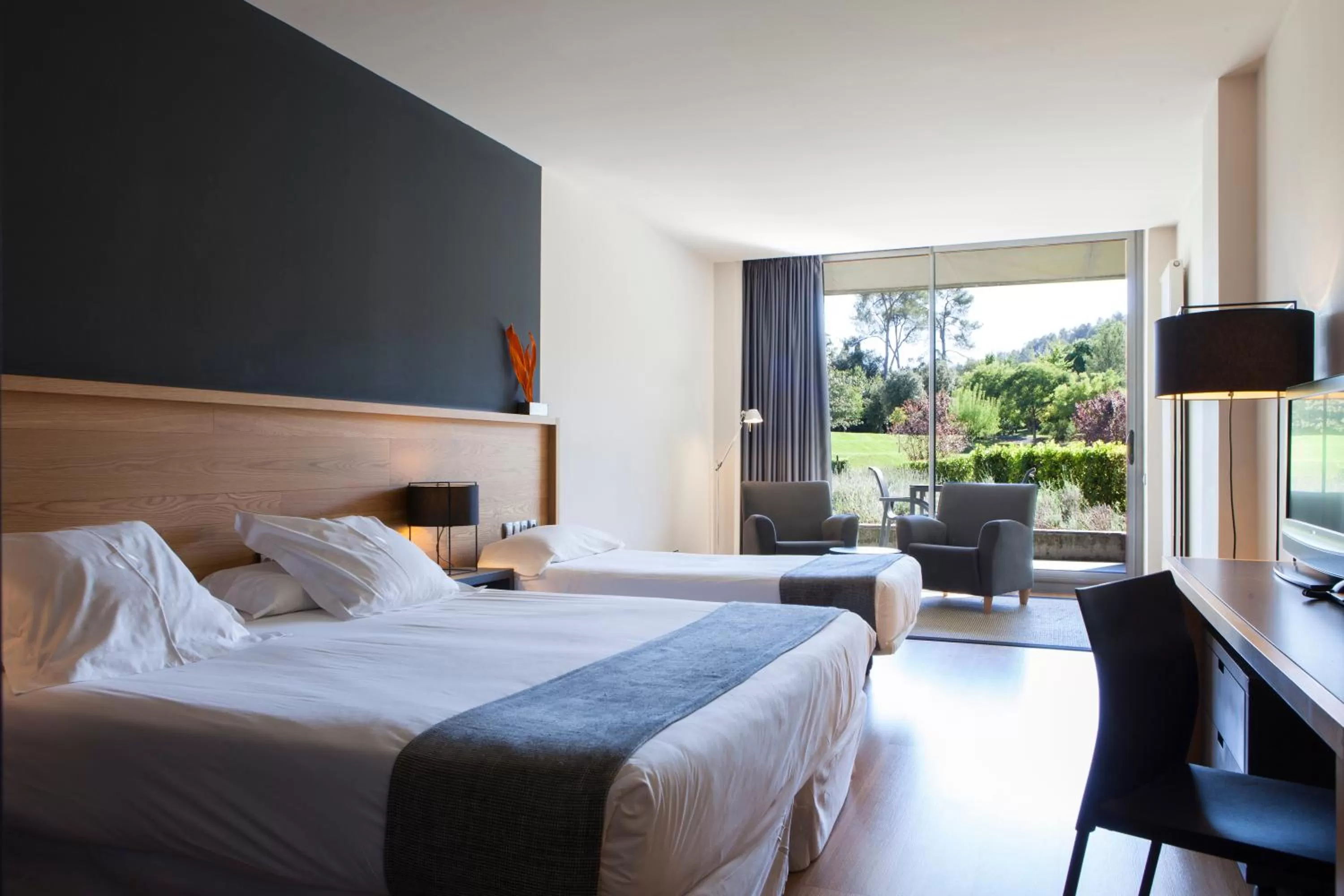 Bed in Hotel Món Sant Benet