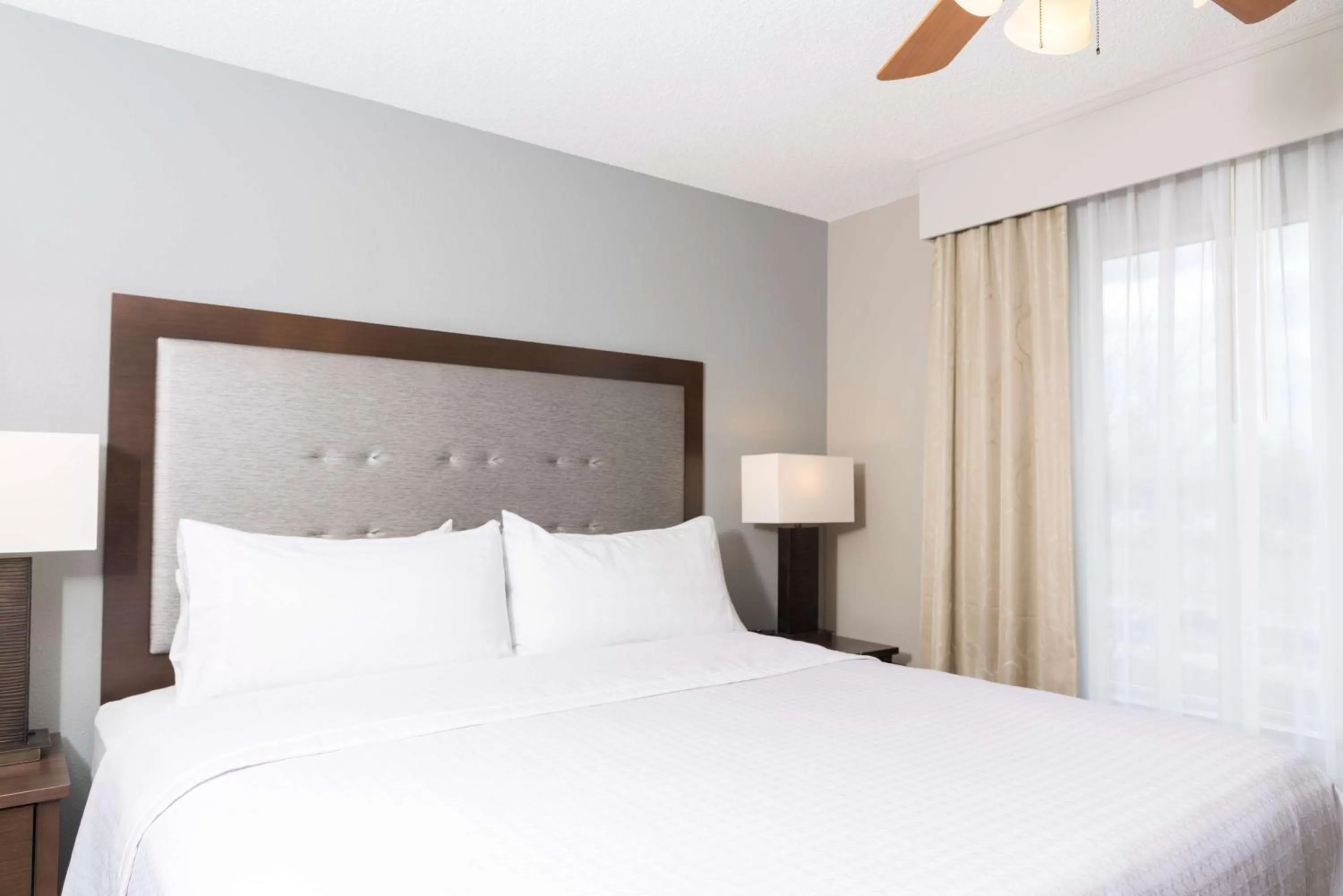 Bed in Homewood Suites by Hilton Bloomington