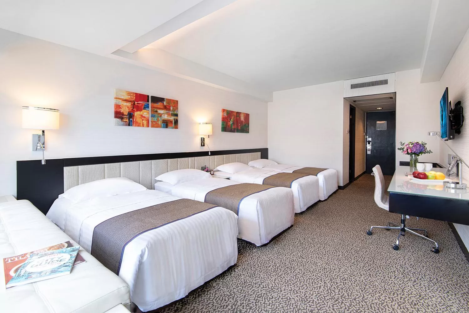 Bed in Regal Riverside Hotel