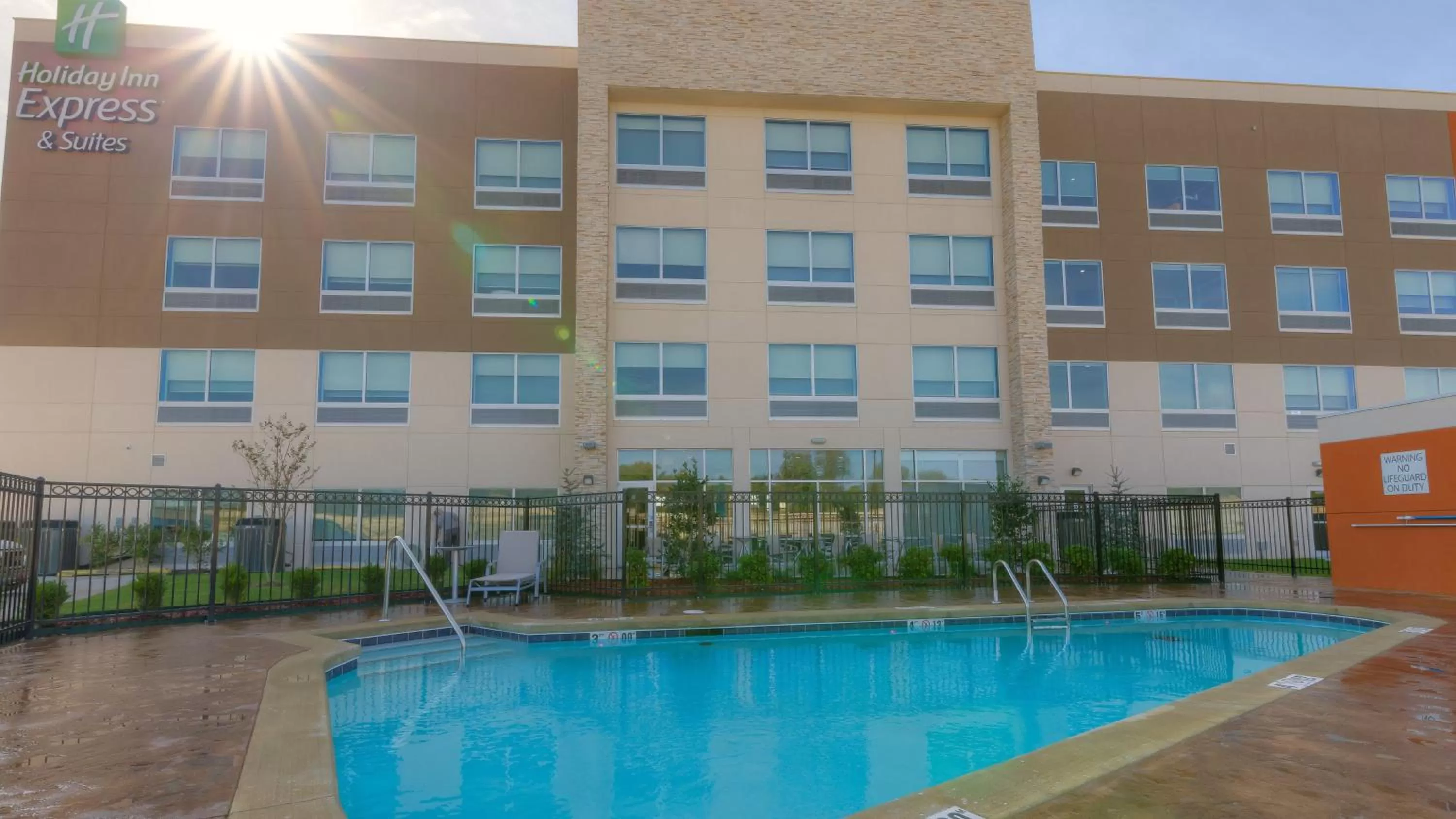 Swimming pool in Holiday Inn Express & Suites Tulsa Midtown by IHG