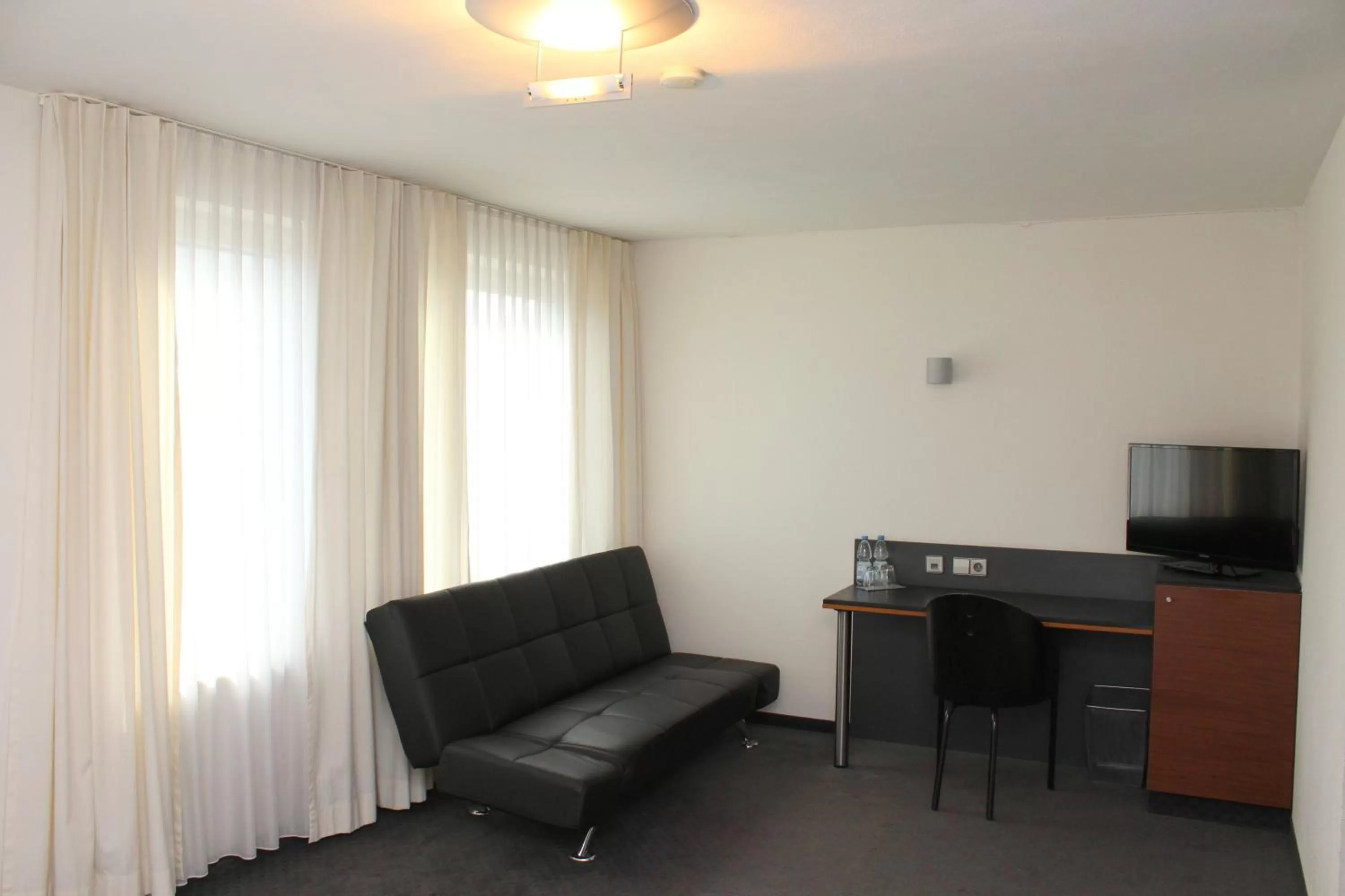 Bedroom in Hotel am Hirschgarten