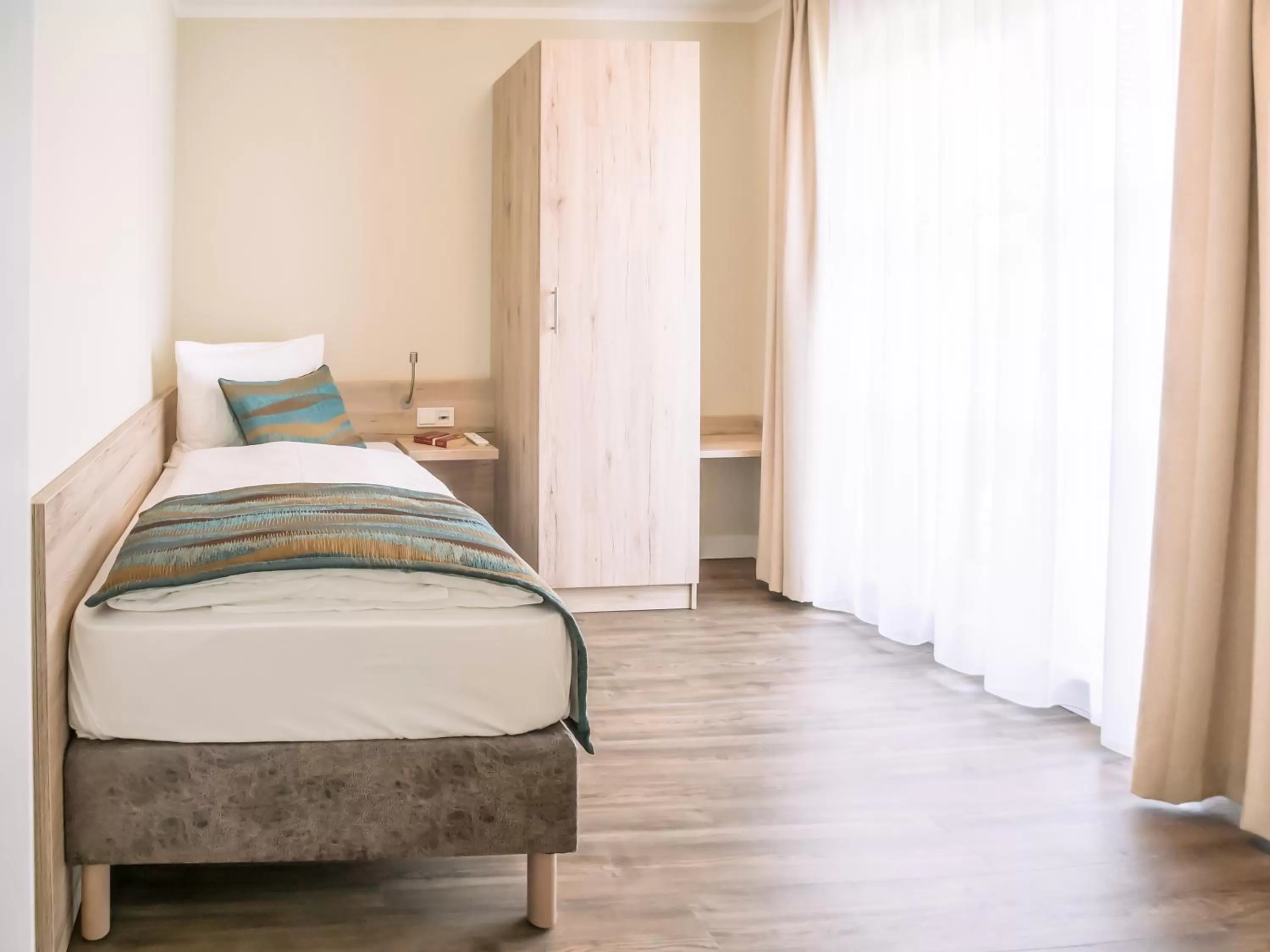 Photo of the whole room, Bed in AKZENT Apartmenthotel Residenz