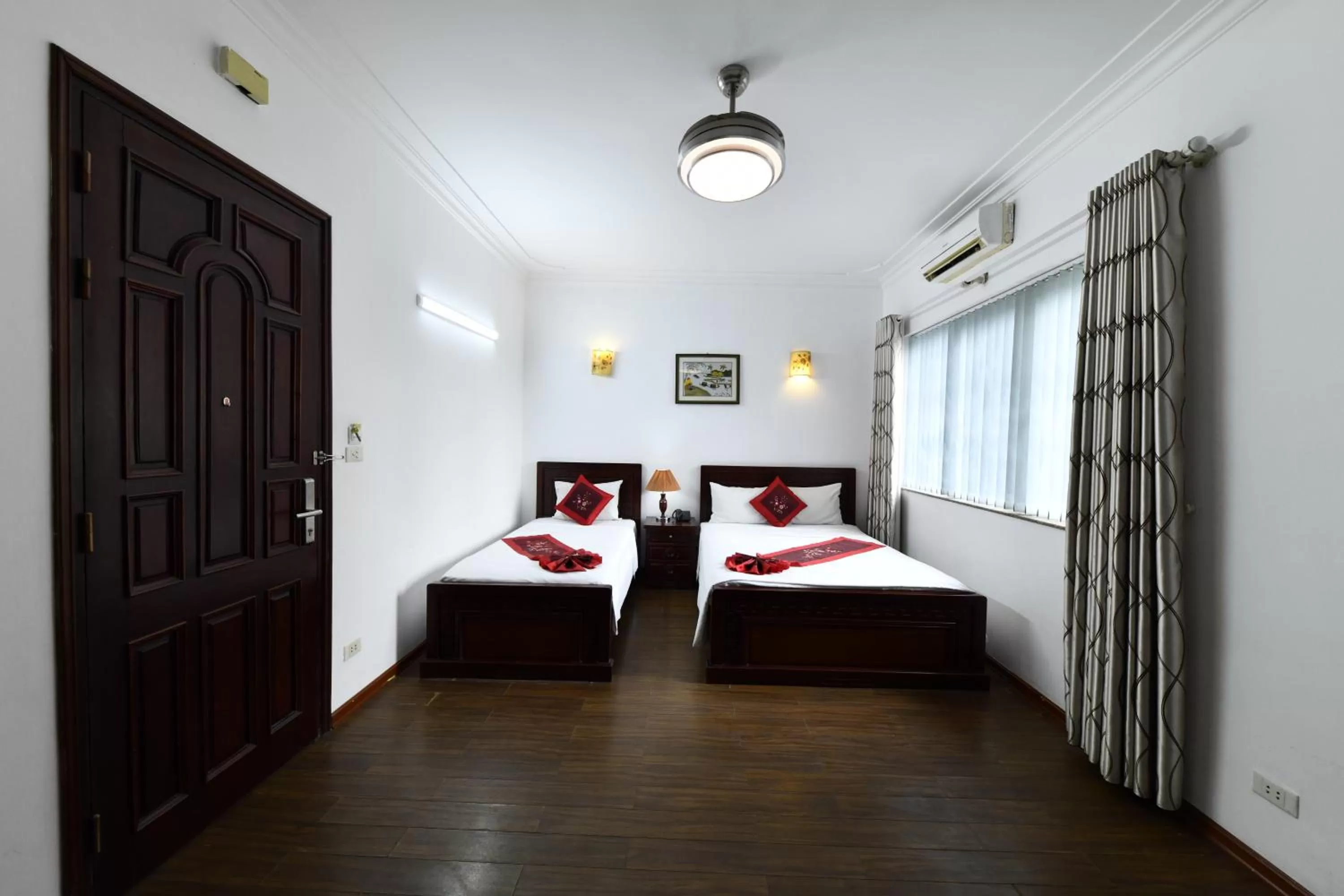 Bed in Phoenix Legend Hotel Hanoi